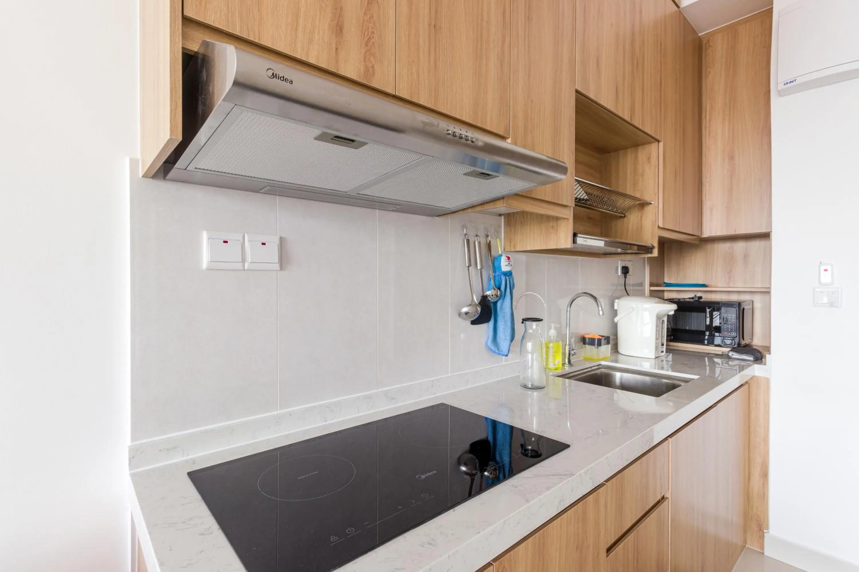 kitchen in Greenfield Residence Bandar Sunway by Airhost