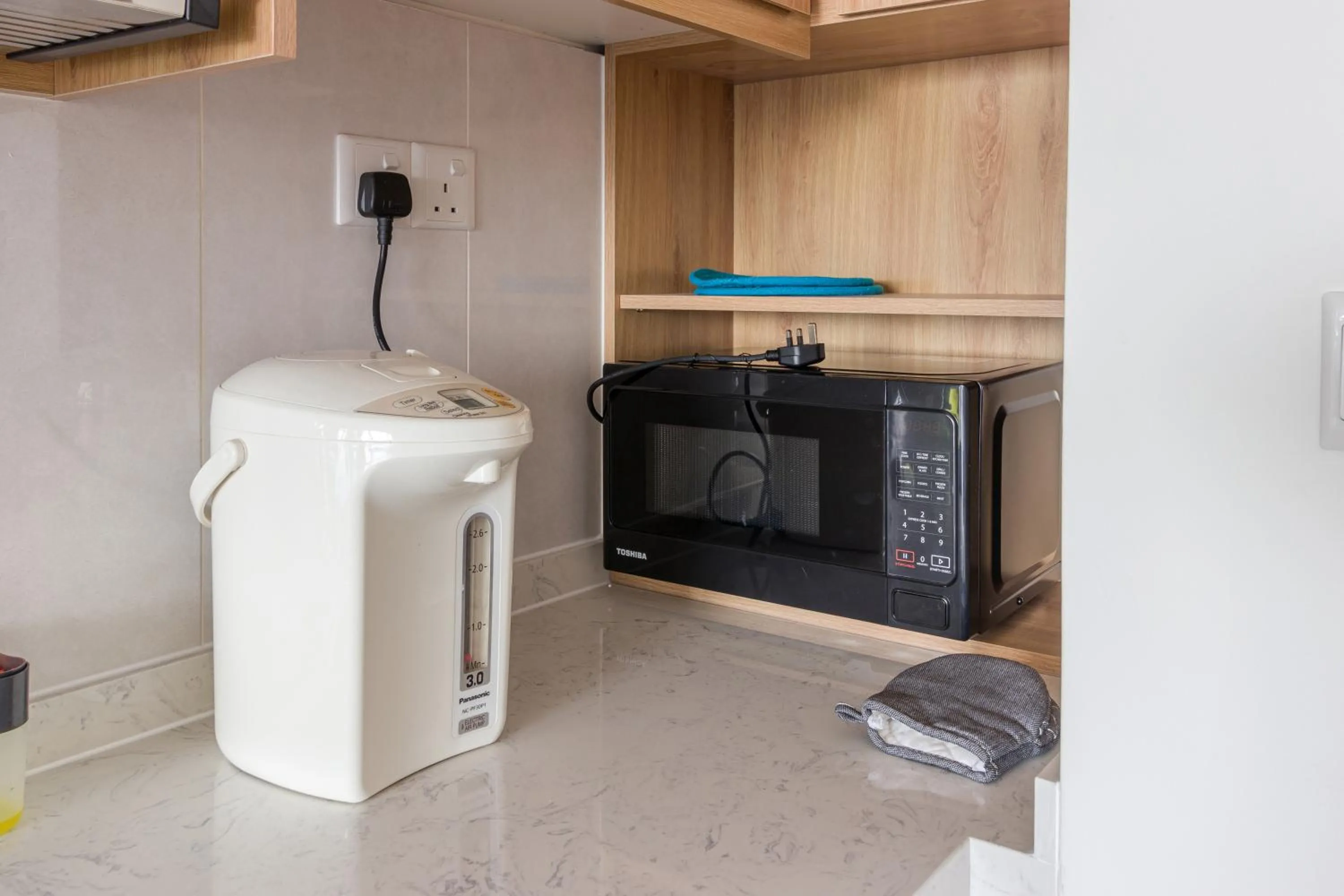 Kitchen or kitchenette in Greenfield Residence Bandar Sunway by Airhost