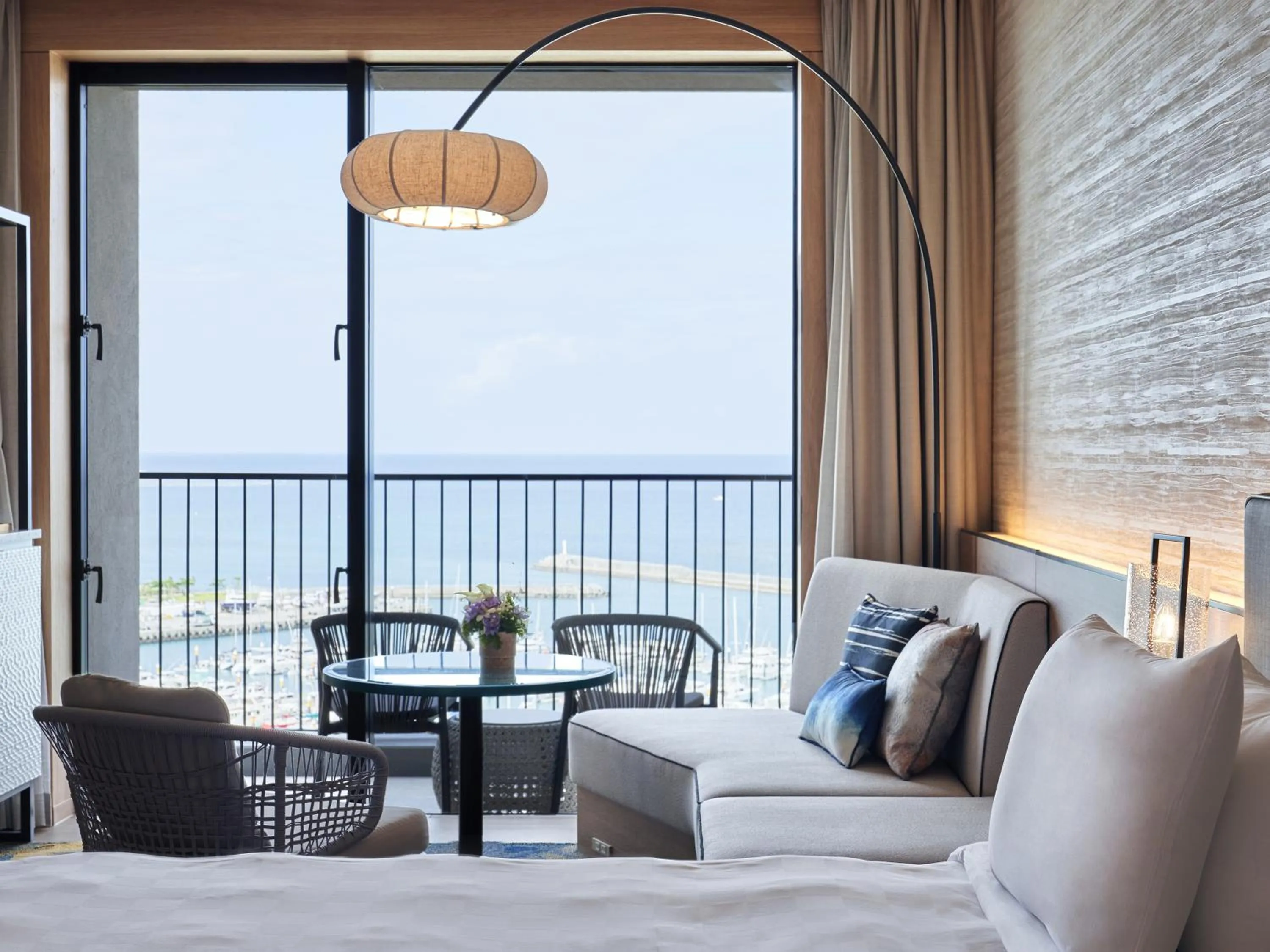 Balcony/Terrace, Bed in Okinawa Prince Hotel Ocean View Ginowan