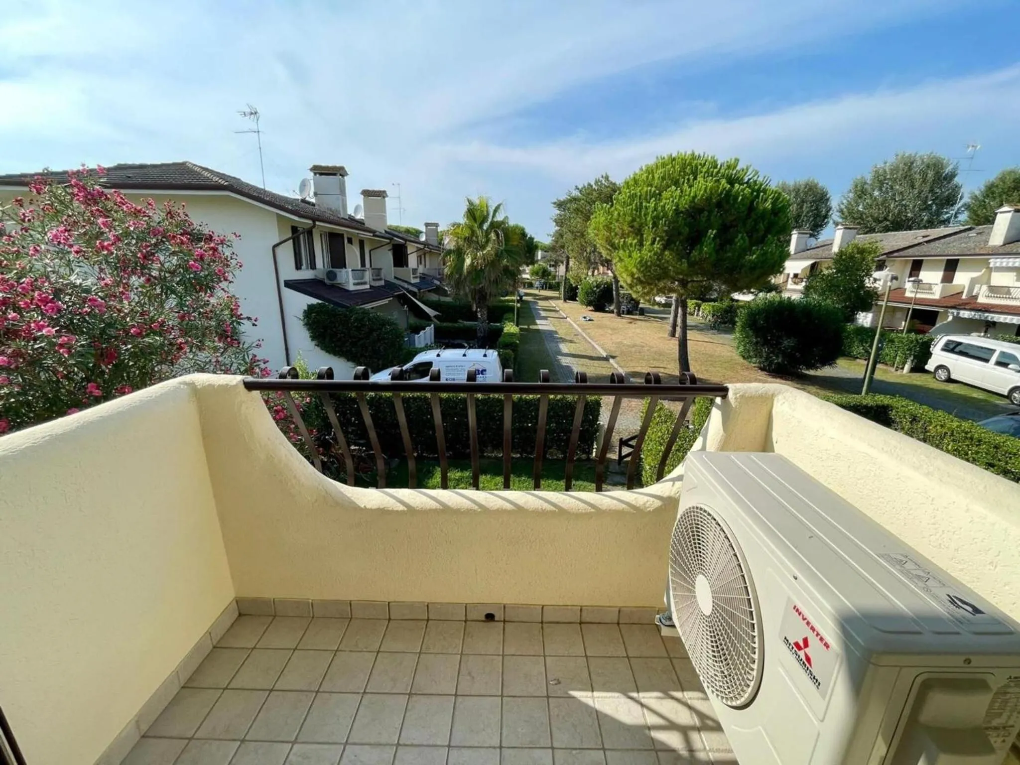 Balcony/Terrace in Colorful house with pool and garden