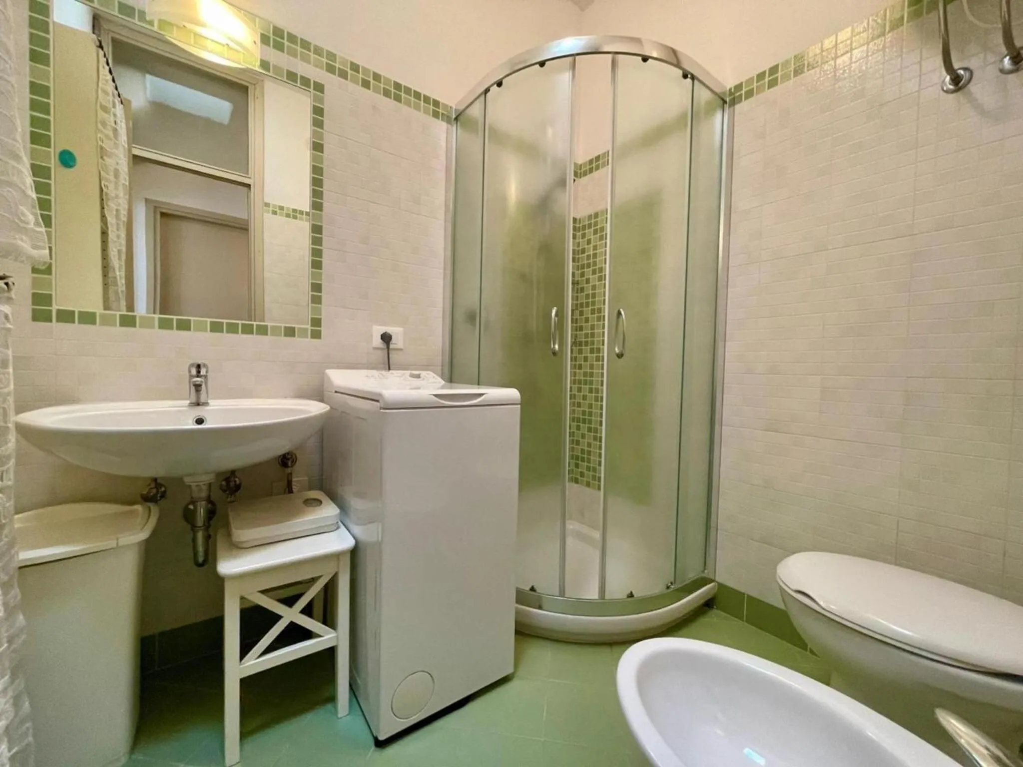washing machine in Colorful house with pool and garden