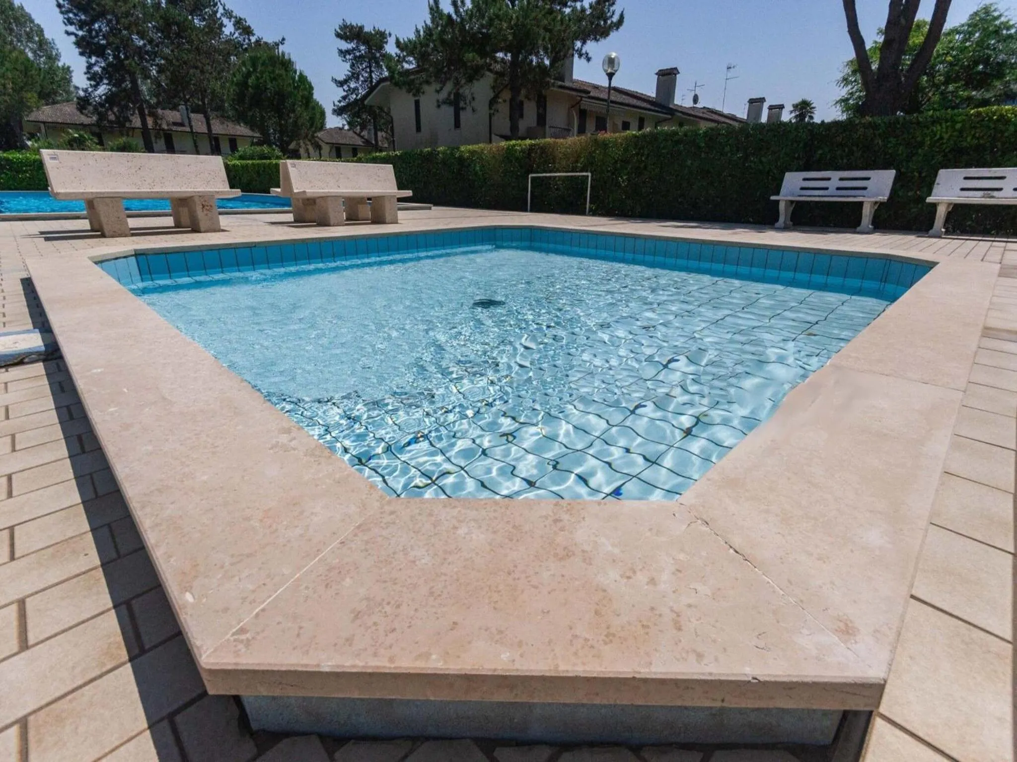 Swimming pool in Colorful house with pool and garden