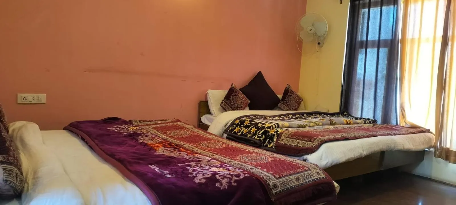 Bed in Hotel Malik Residency