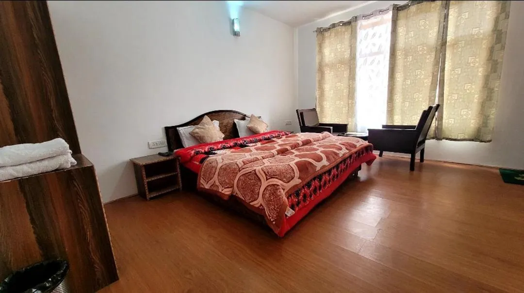 Bed in Hotel Malik Residency