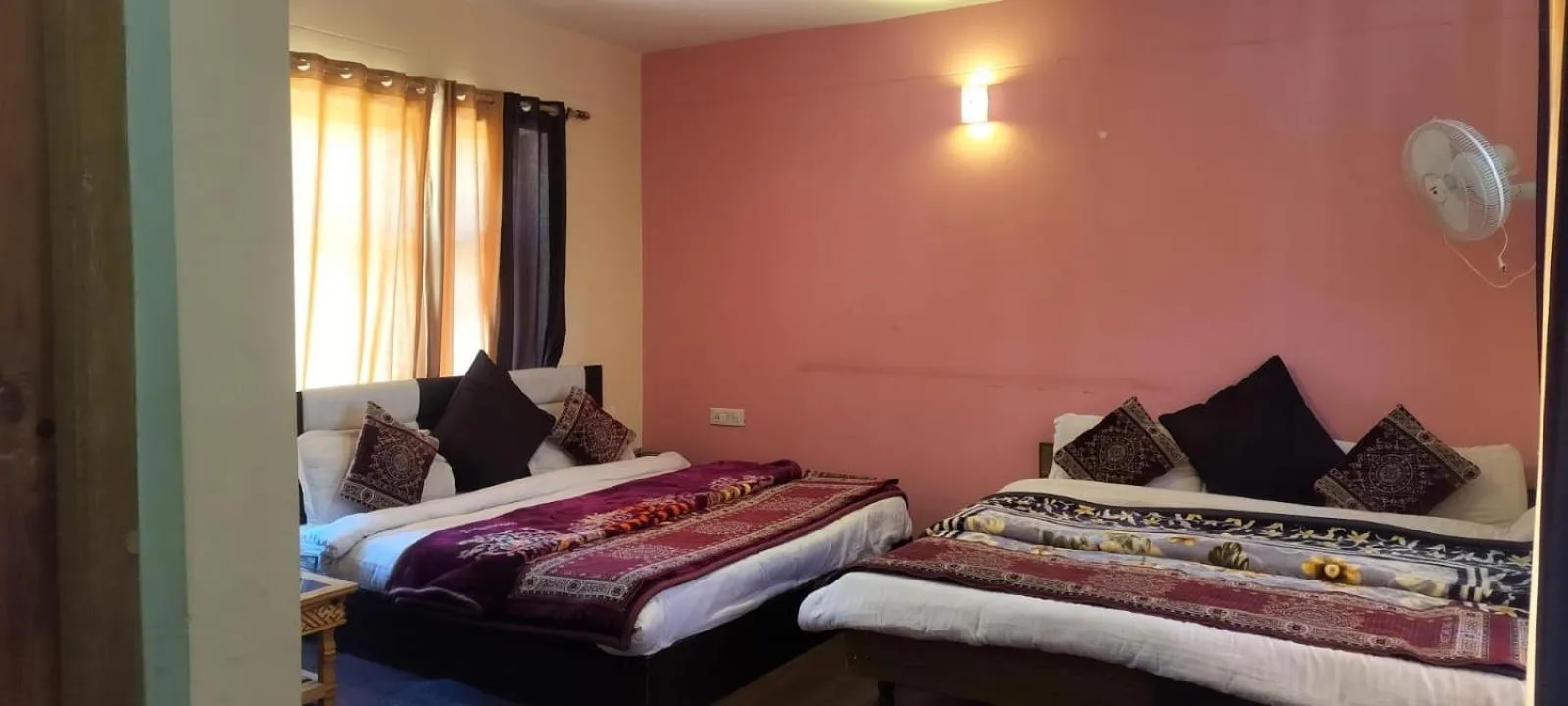 Bed in Hotel Malik Residency