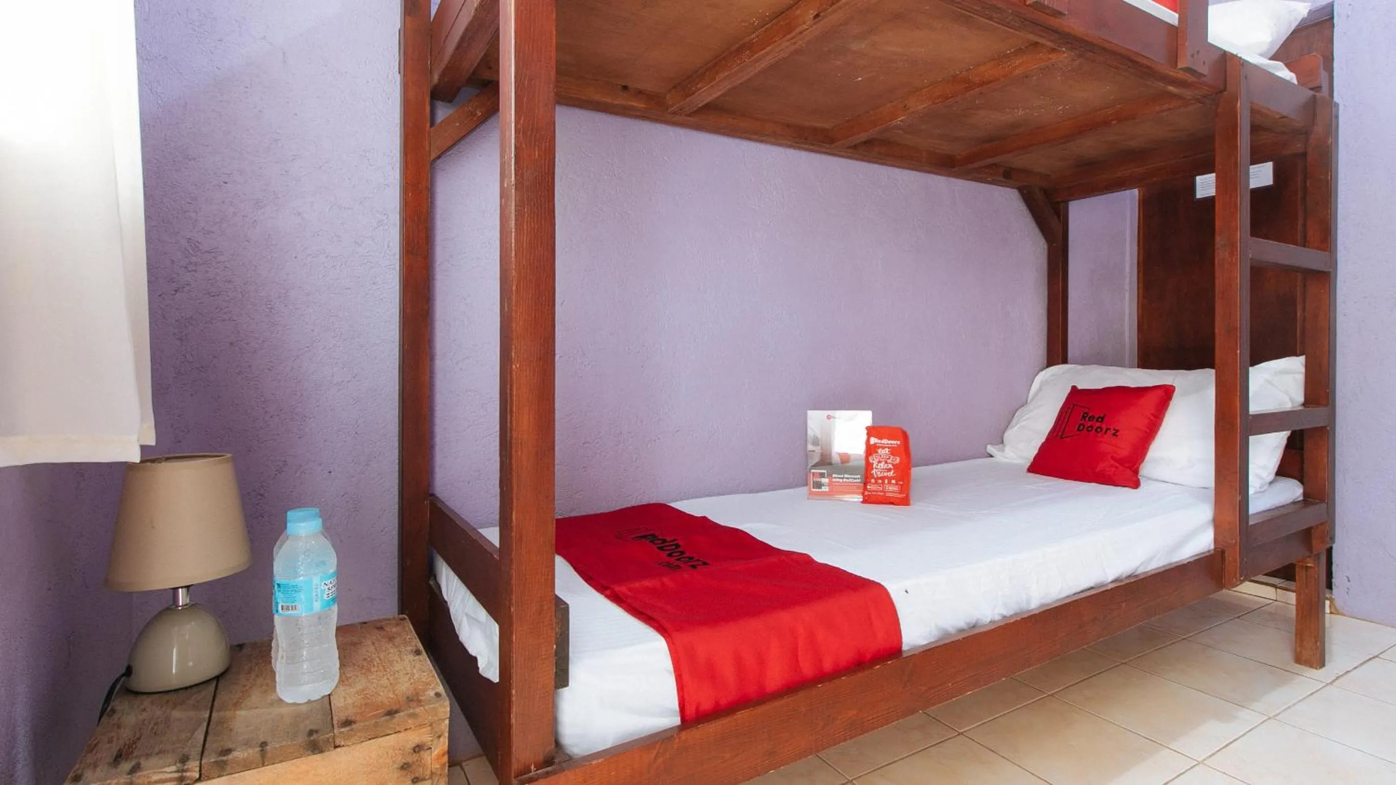 Photo of the whole room, Bed in RedDoorz Sonia Unidos Magroves Garden Resort RedPartner