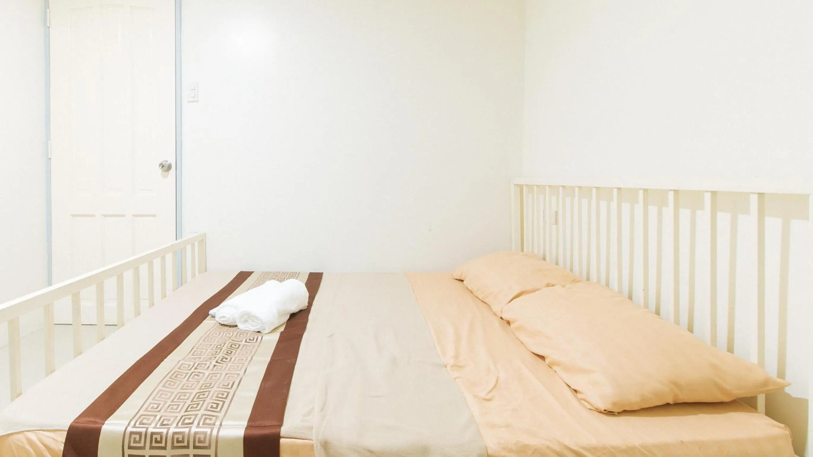 Bed in RedDoorz Sonia Unidos Magroves Garden Resort RedPartner