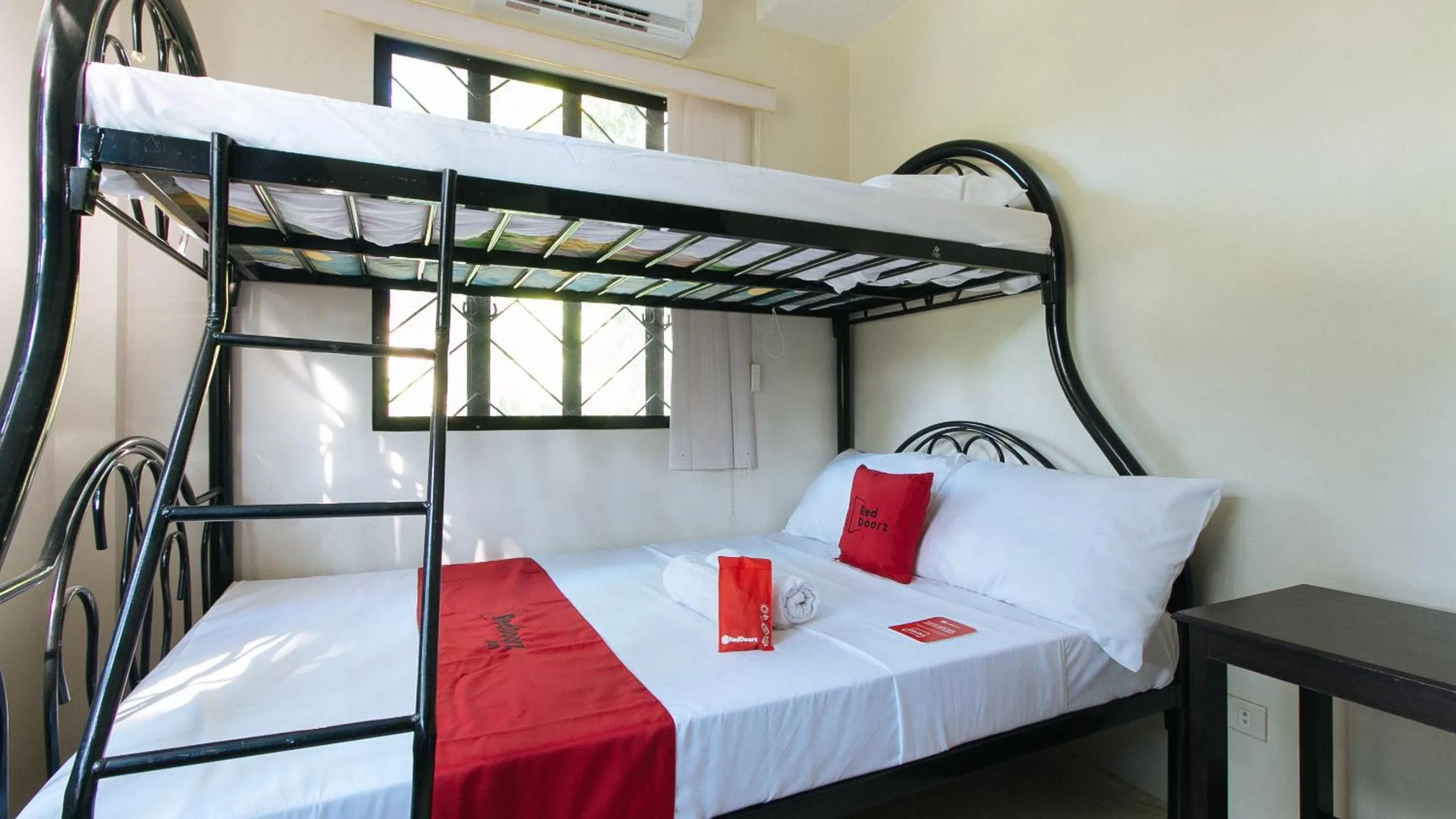 Photo of the whole room, Bed in RedDoorz Sonia Unidos Magroves Garden Resort RedPartner