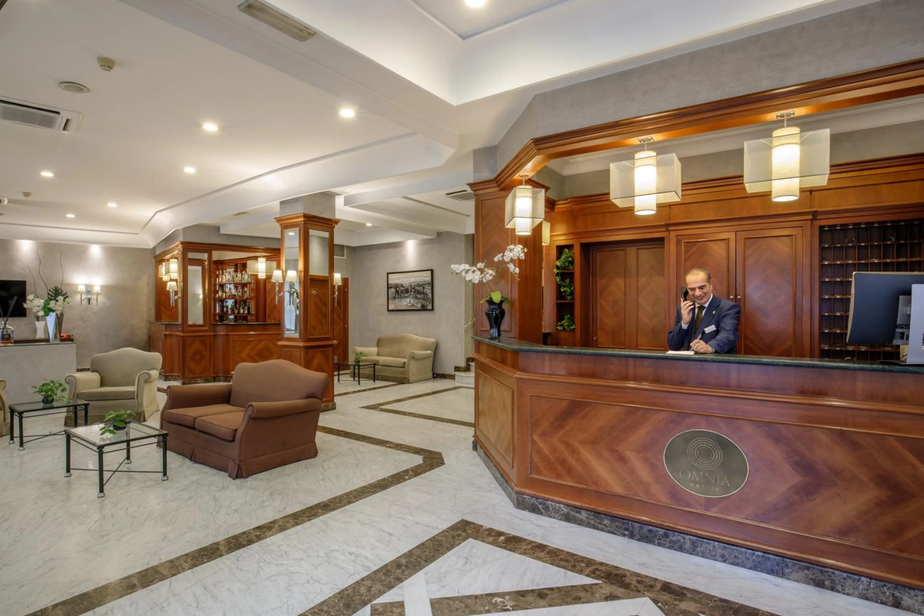 Lobby or reception in Hotel Santa Costanza by OMNIA hotels