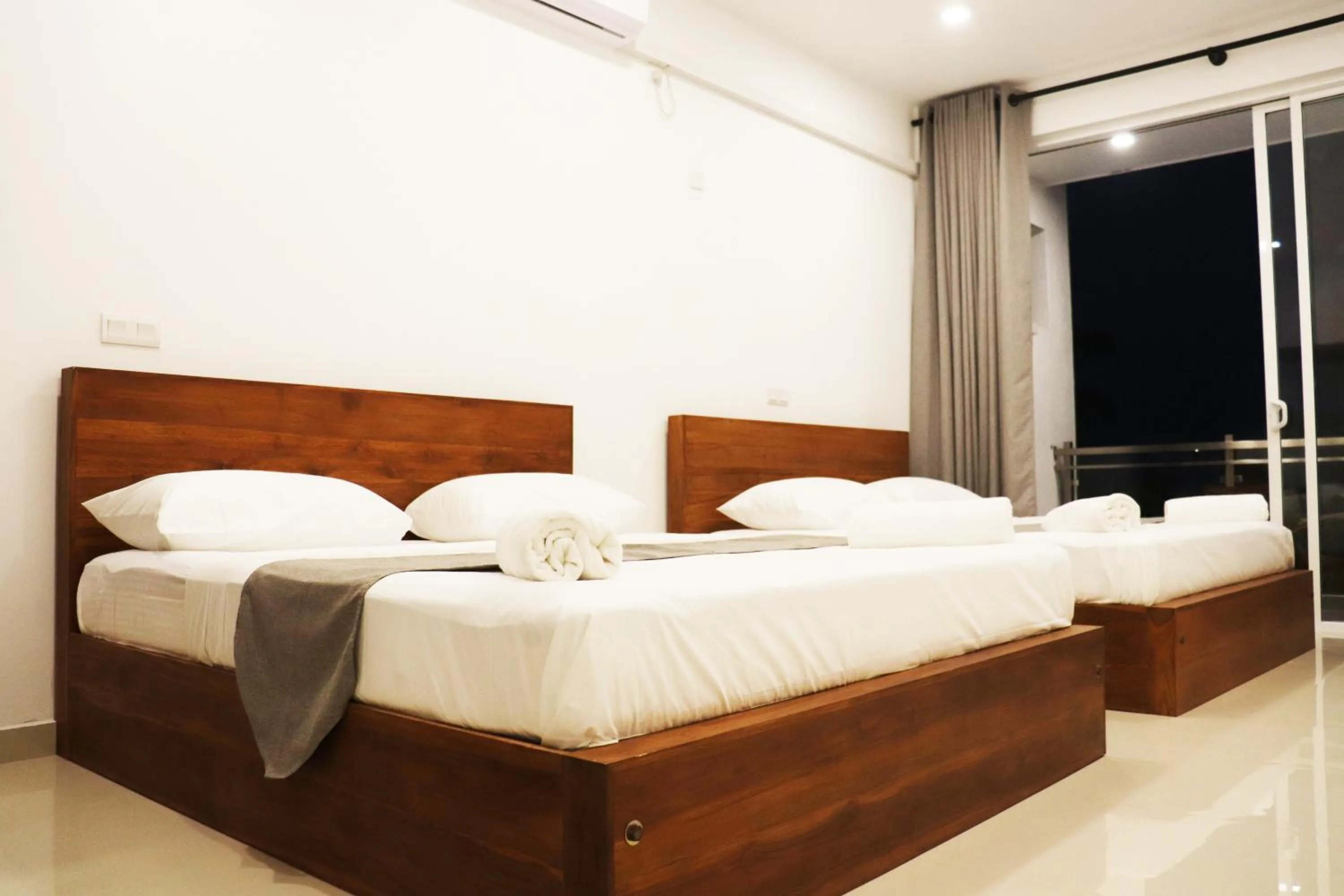 Bed in Marakolliya Beach Resort