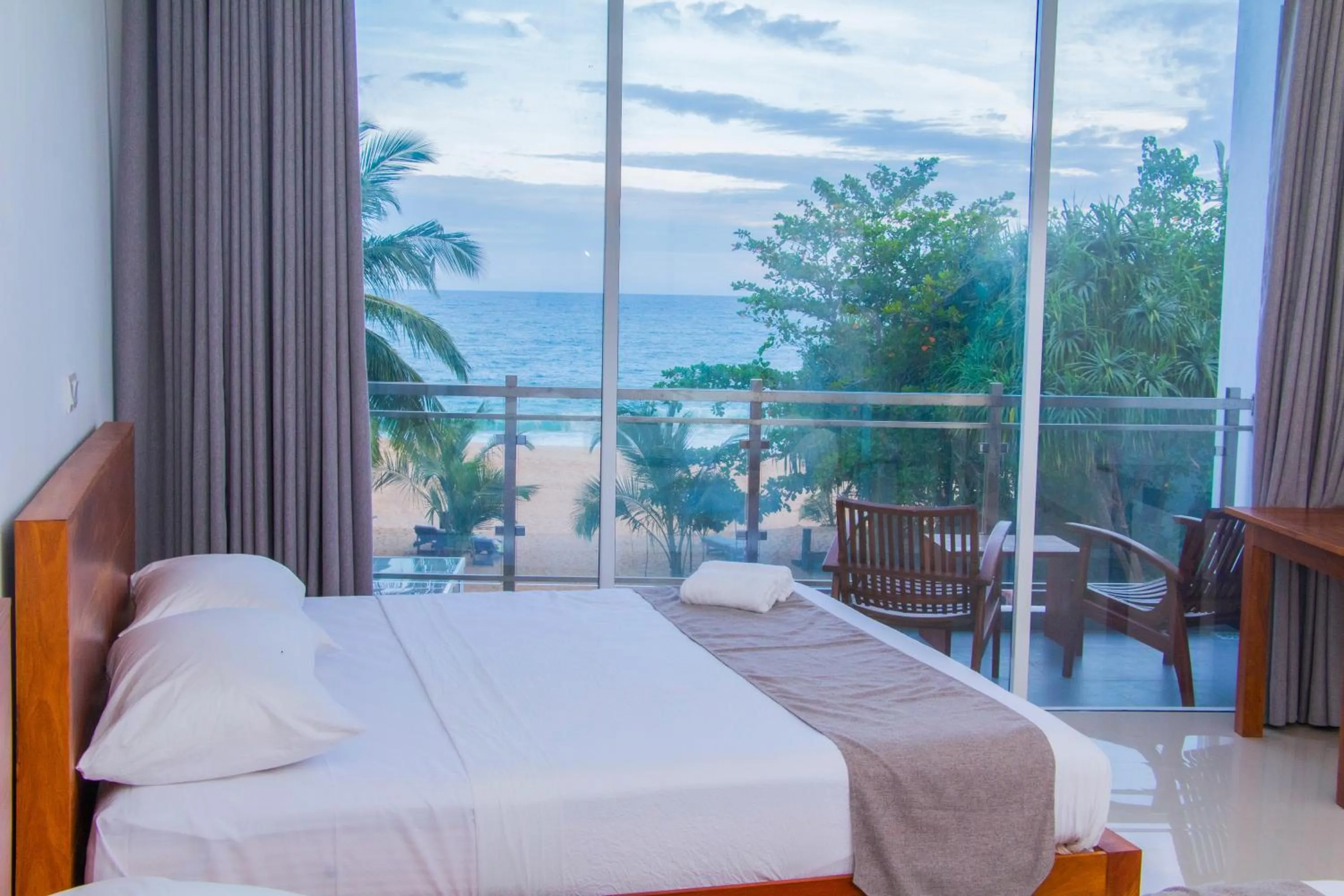 Bed in Marakolliya Beach Resort