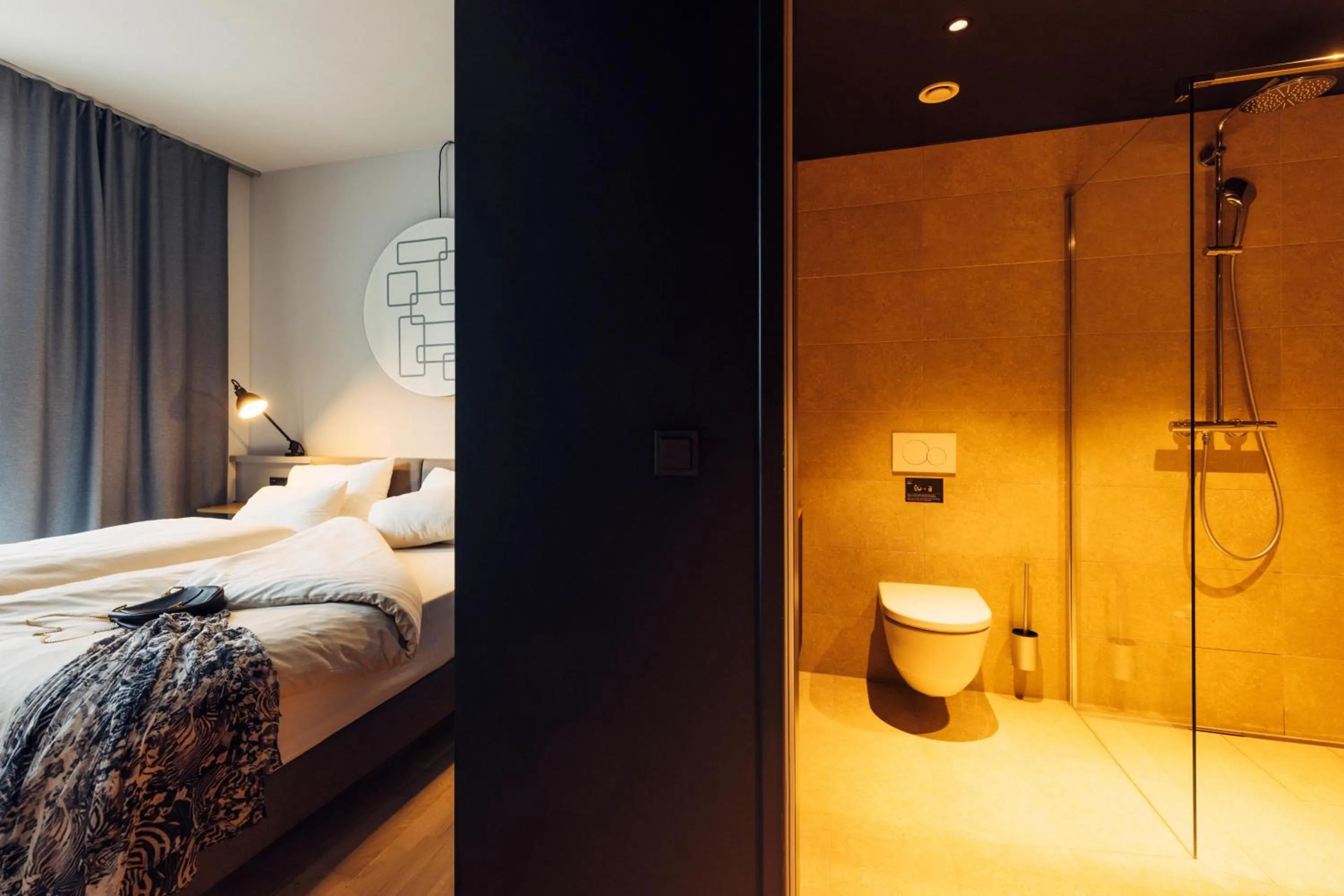 Bathroom, Bed in harry's home Telfs hotel & apartments