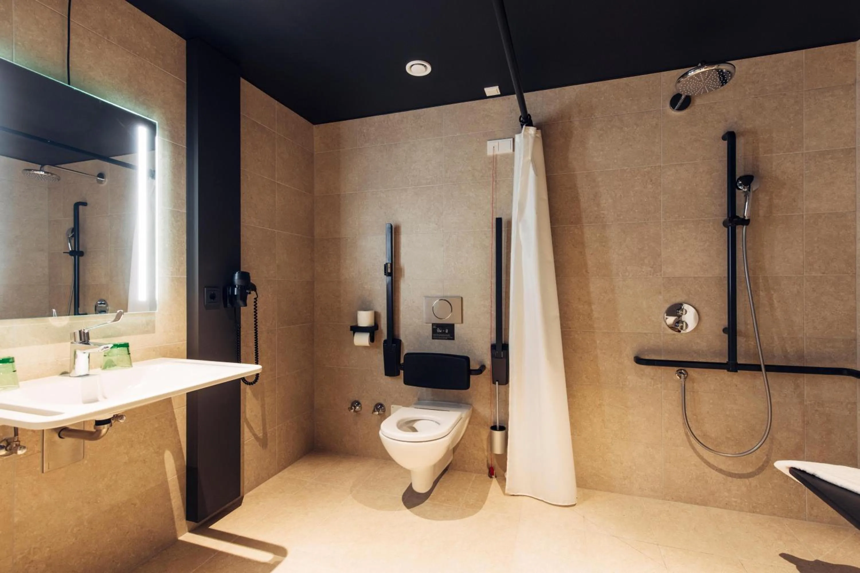 Bathroom in harry's home Telfs hotel & apartments