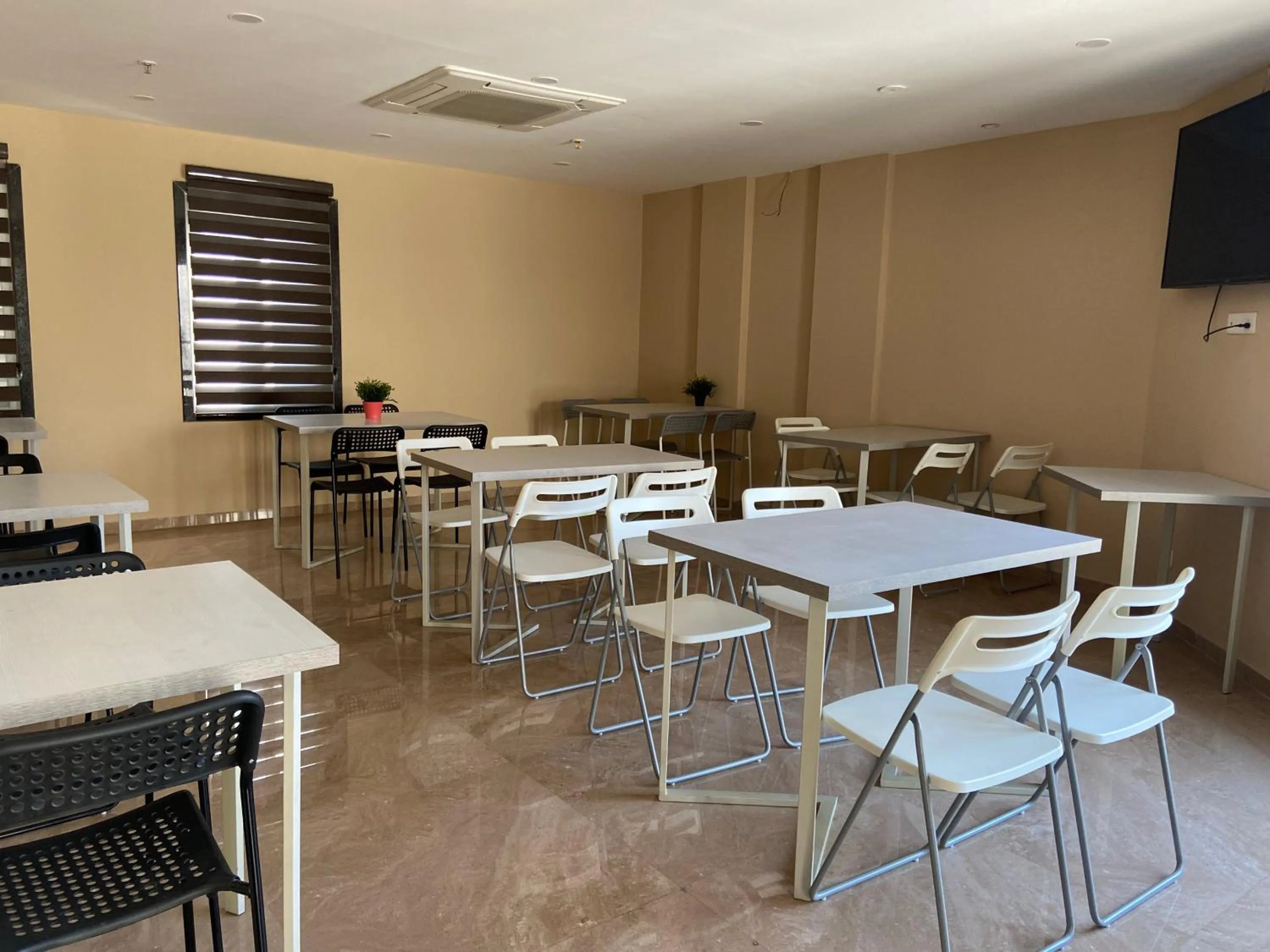 Dining area in Dash Hotels - Affordable Luxury