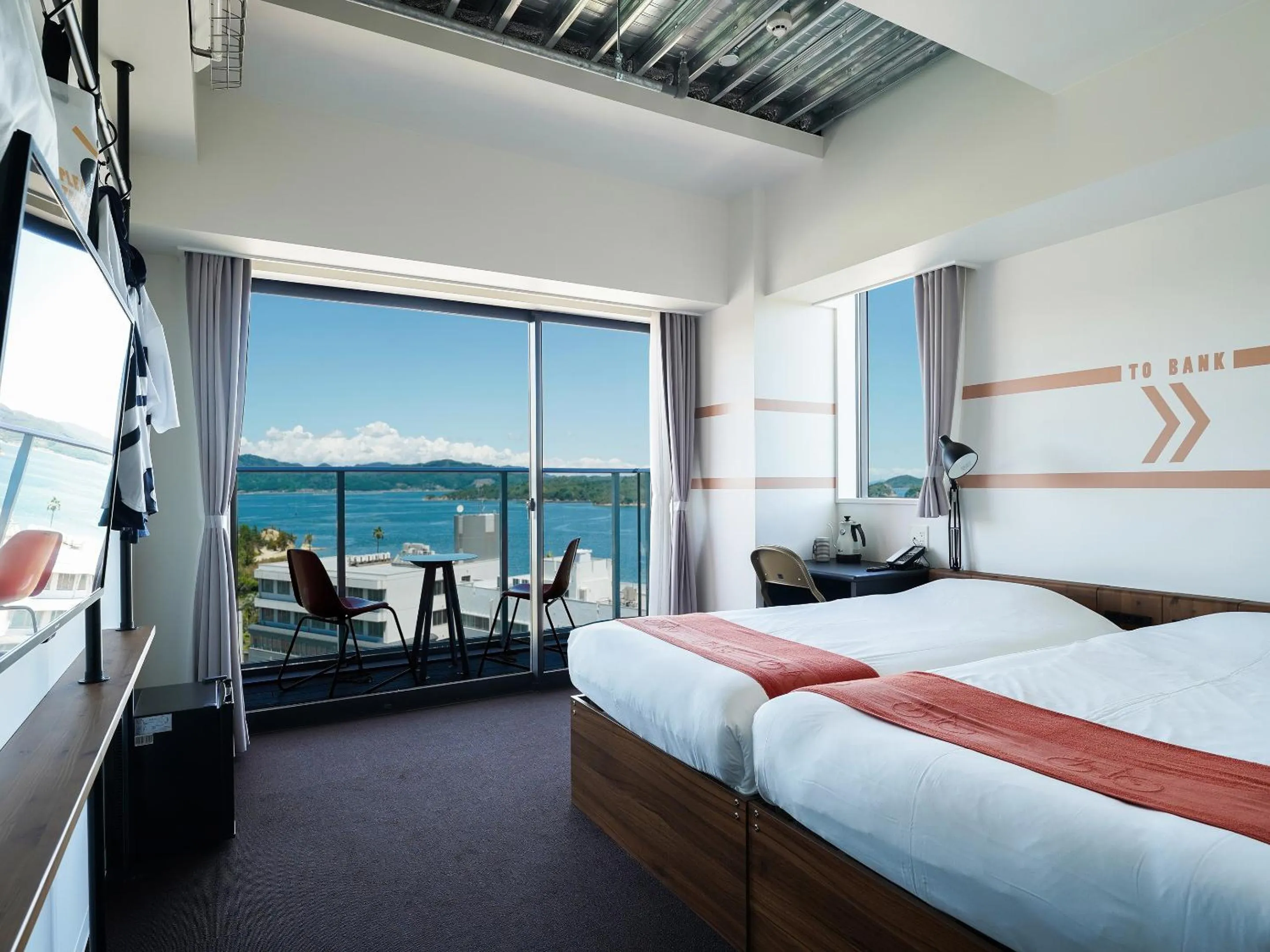 Day, Bed in SETOUCHI KEIRIN HOTEL 10 by Onko Chishin