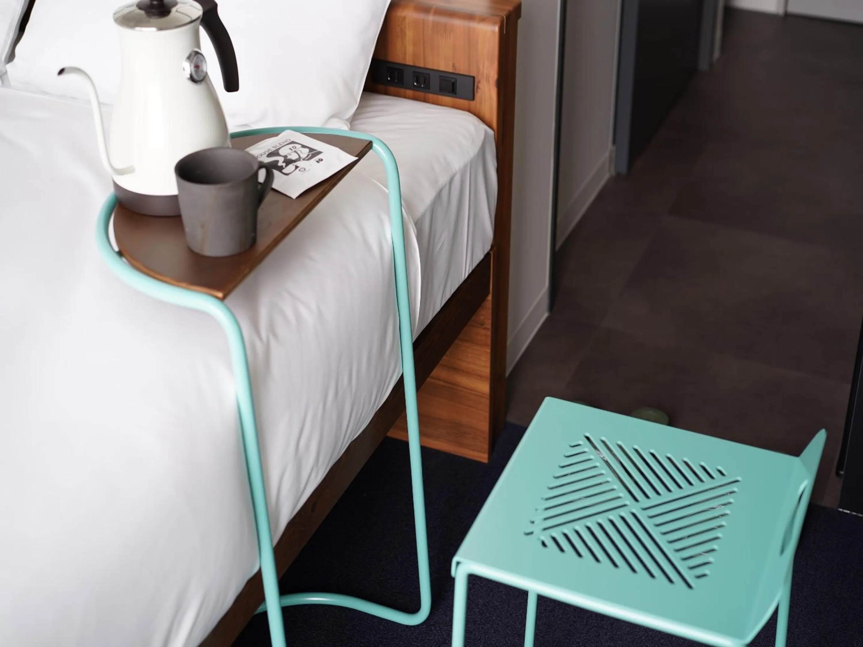 Decorative detail, Bed in SETOUCHI KEIRIN HOTEL 10 by Onko Chishin