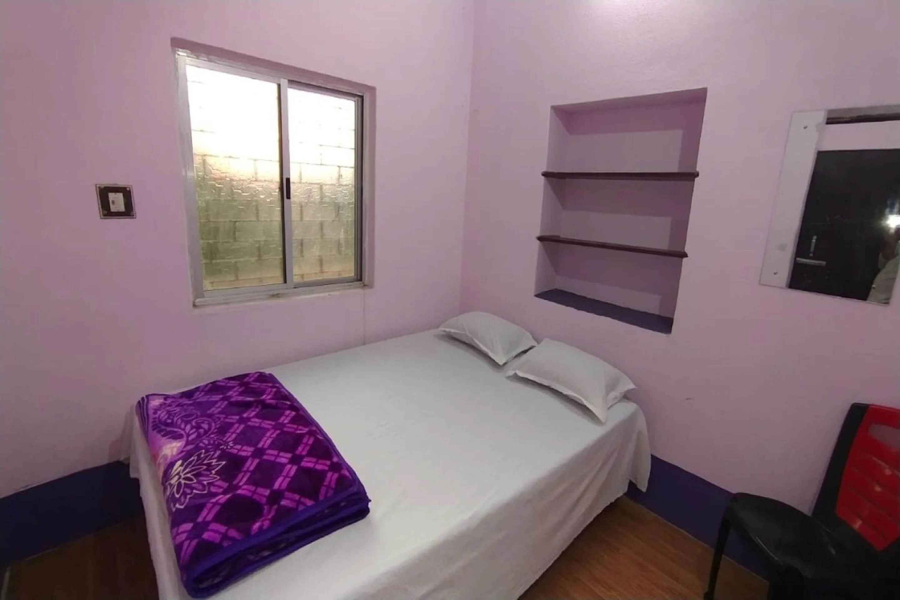 Bedroom in SPOT ON Ganguly Hotel Lodging And Fooding