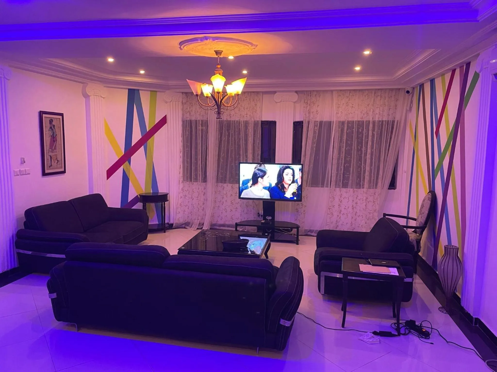 Communal lounge/ TV room in HOTEL LES ARCADES