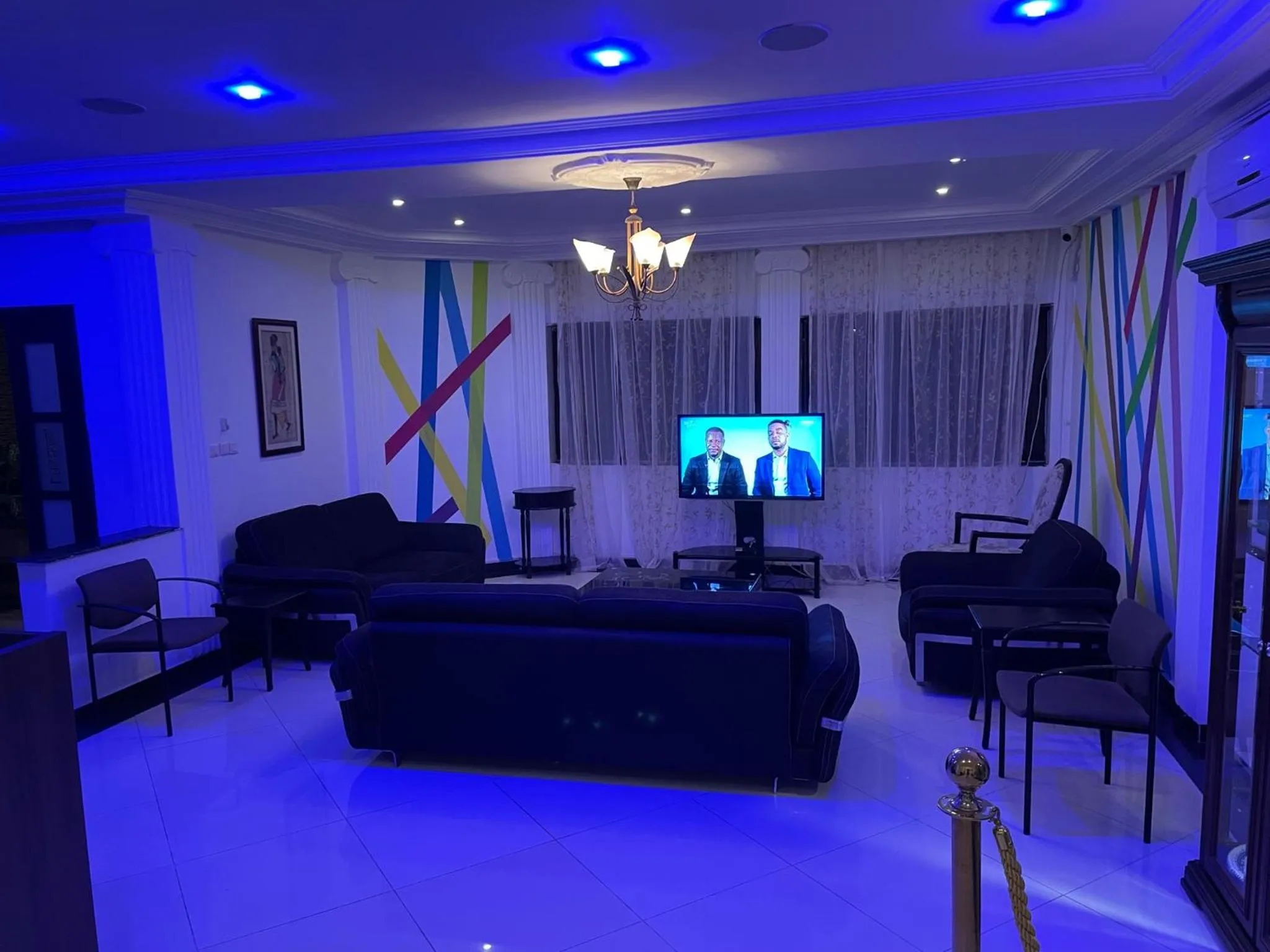 Communal lounge/ TV room in HOTEL LES ARCADES