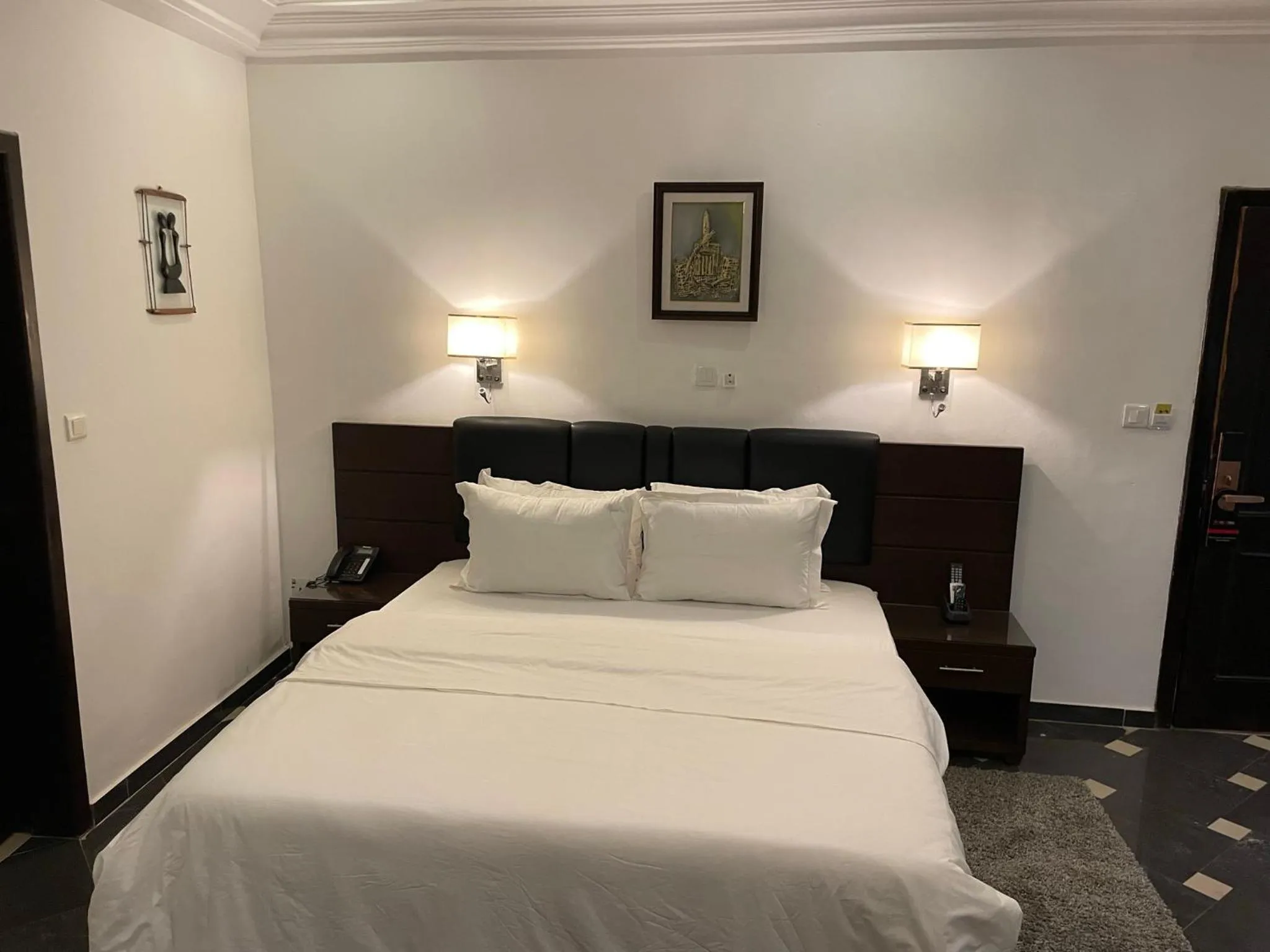 Bed in HOTEL LES ARCADES