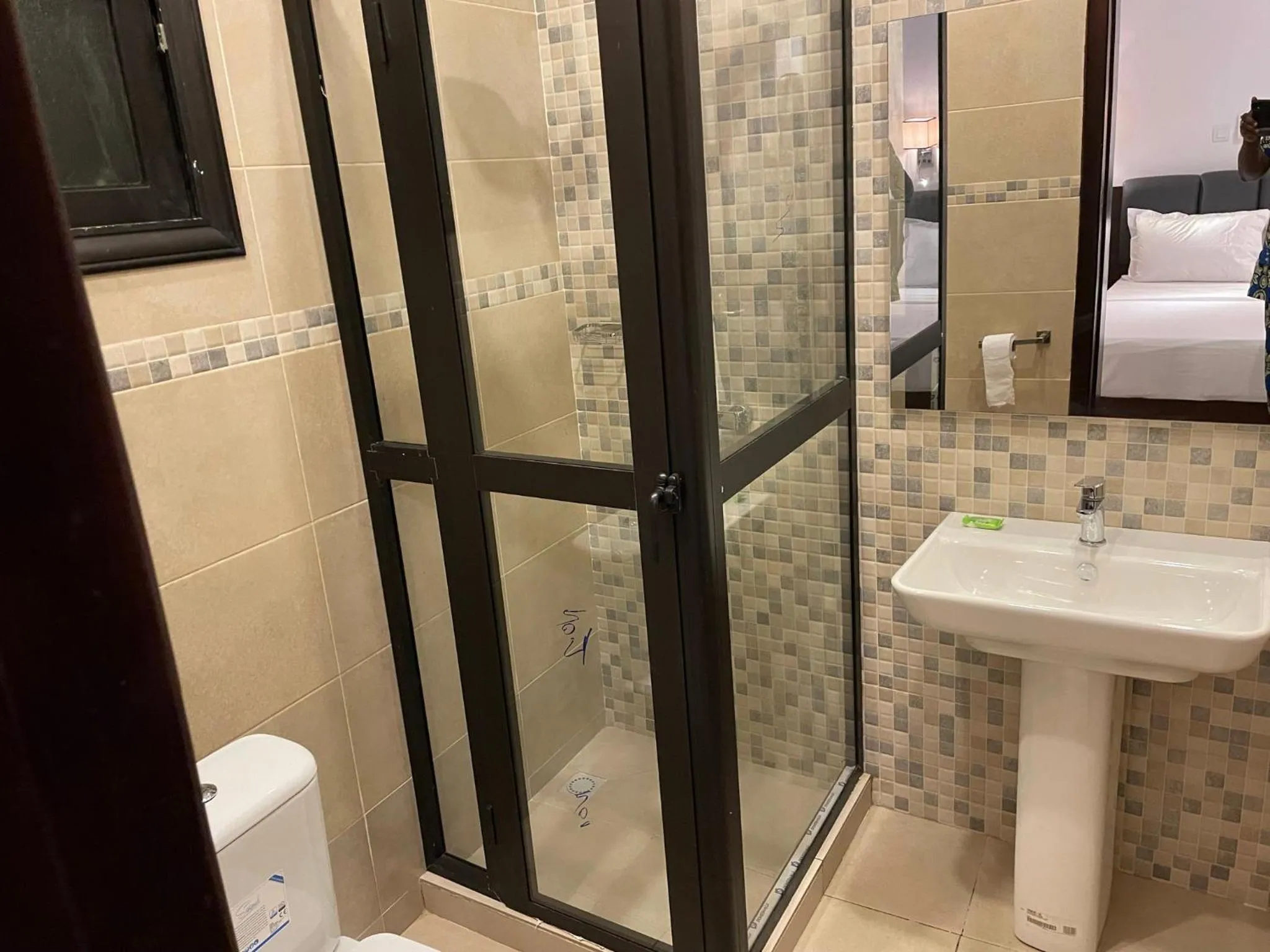 Shower in HOTEL LES ARCADES