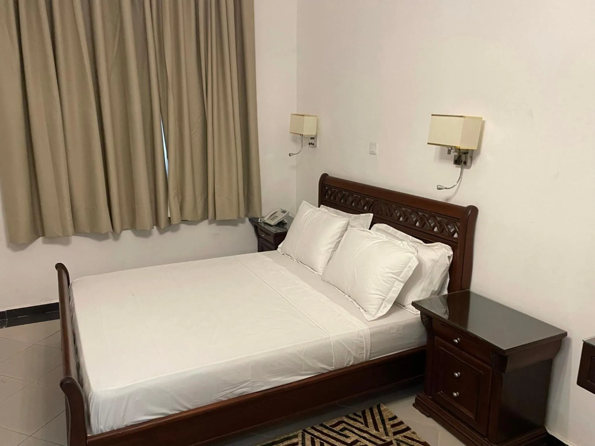 Bed in HOTEL LES ARCADES