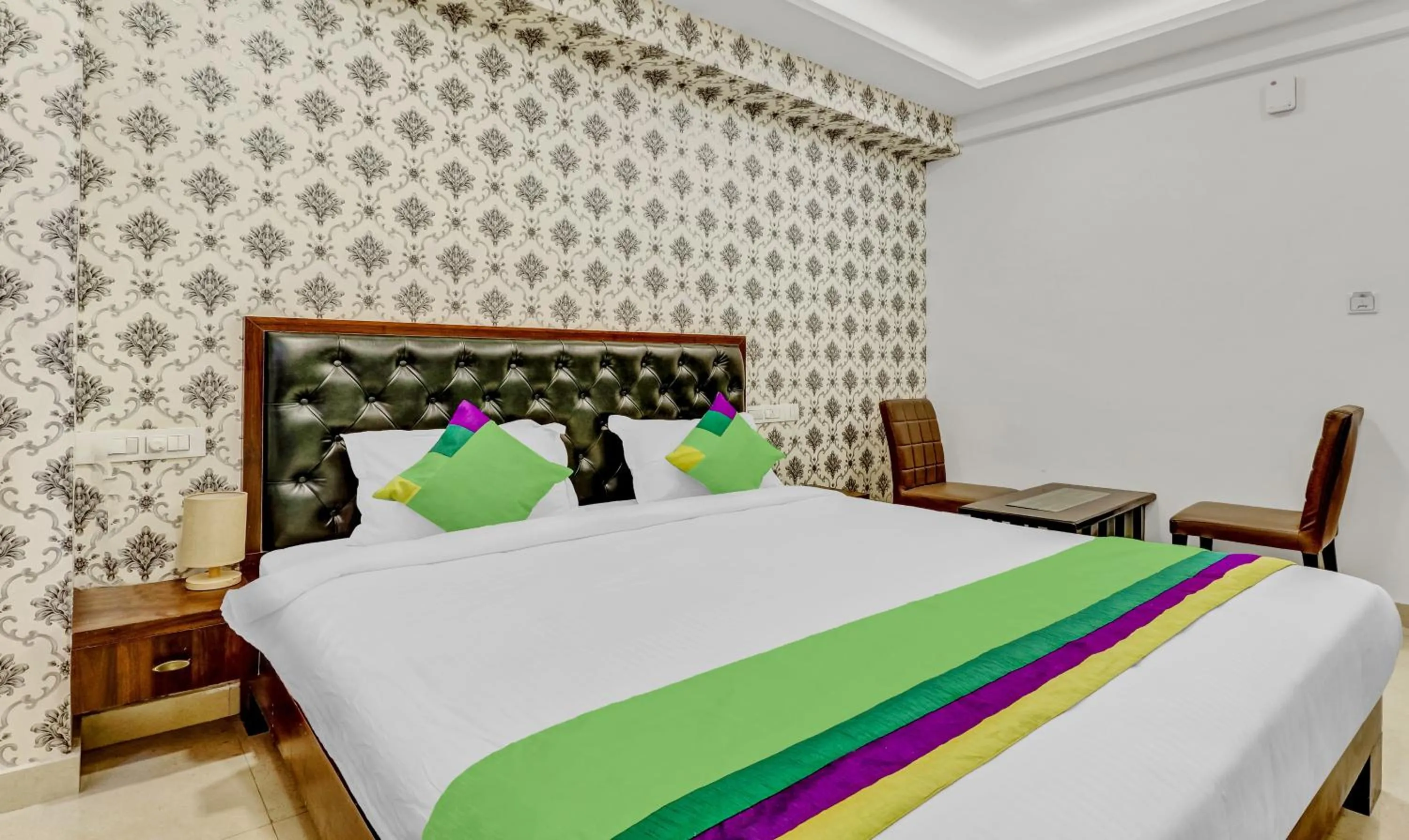 Bedroom, Bed in Treebo Three Drops