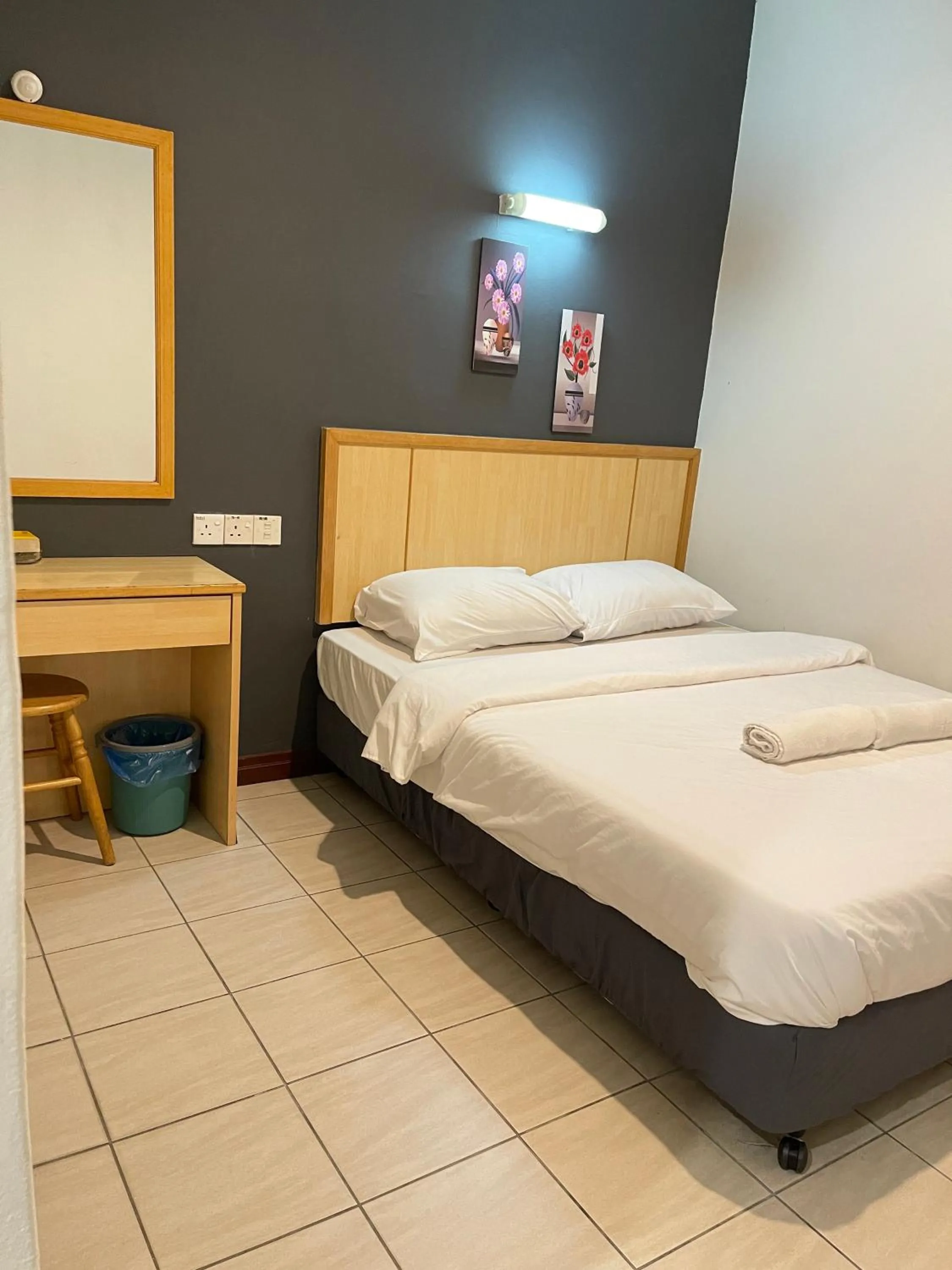 Bed in Fresh Hotel Falim