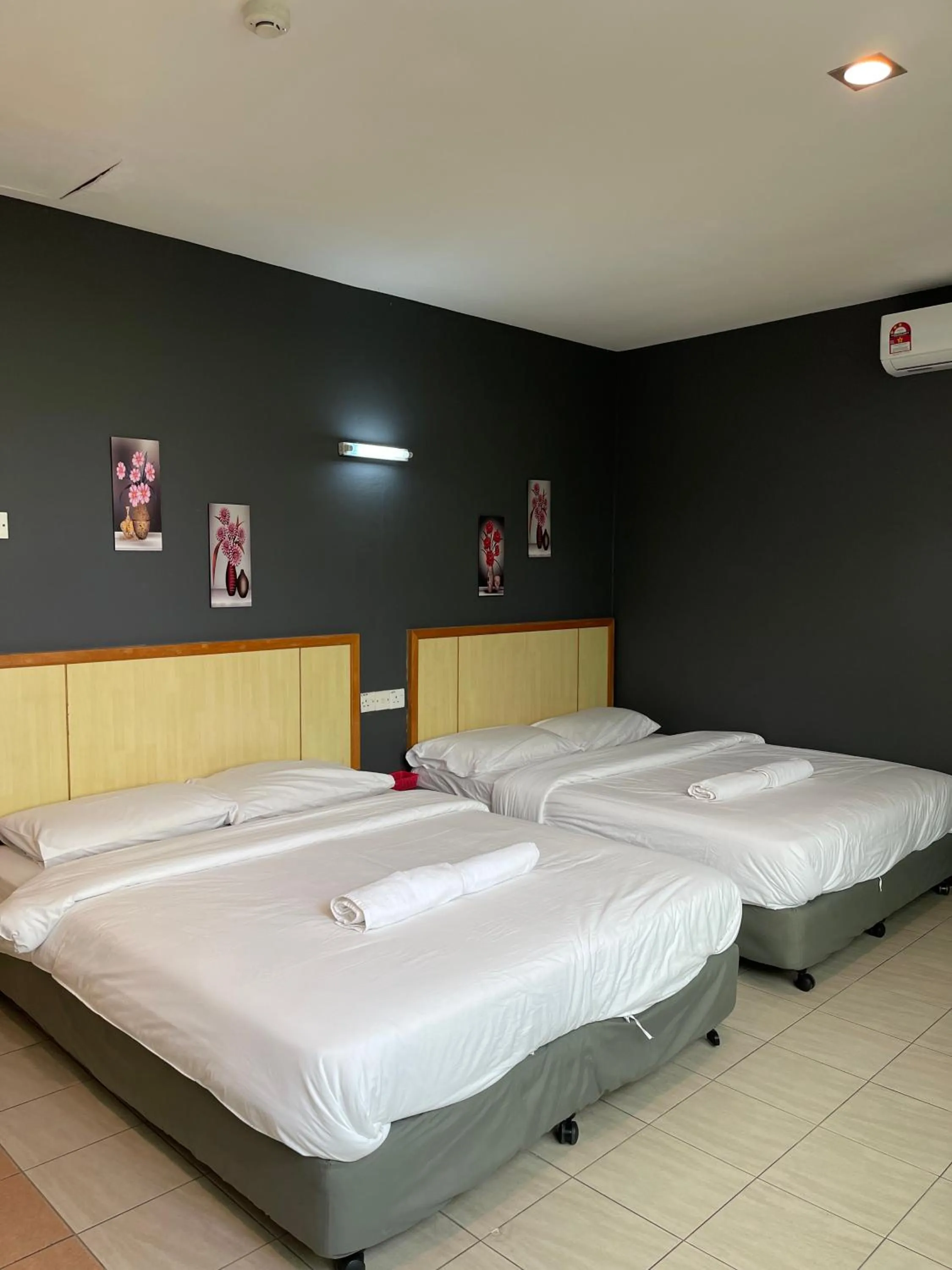 Bed in Fresh Hotel Falim