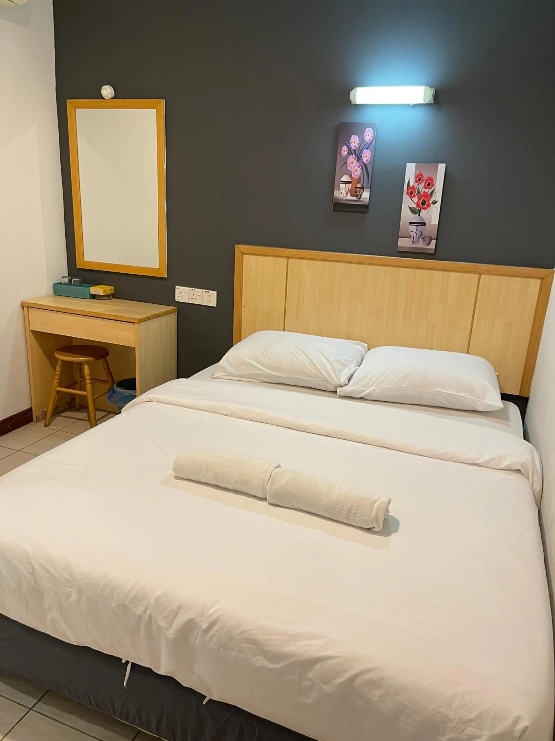 Bed in Fresh Hotel Falim