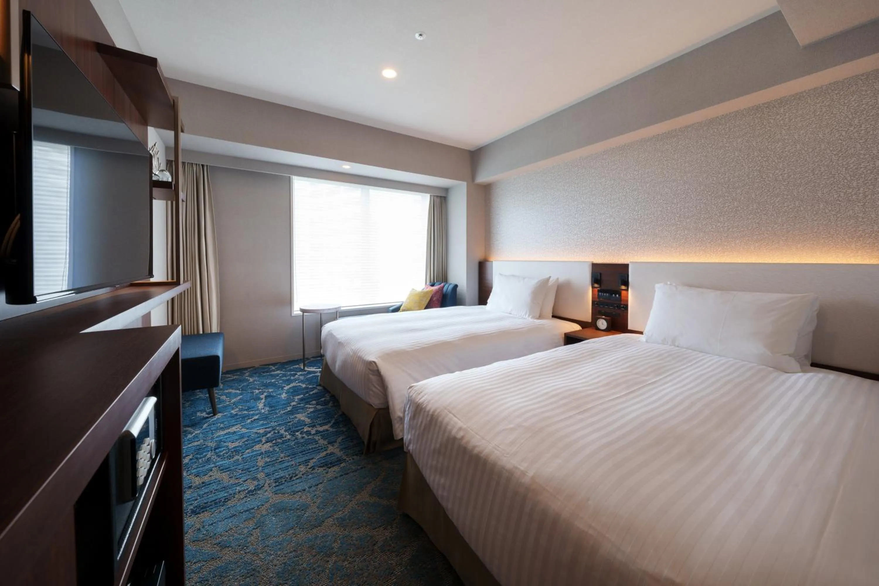 Bed in Hotel GrandConsort Naha