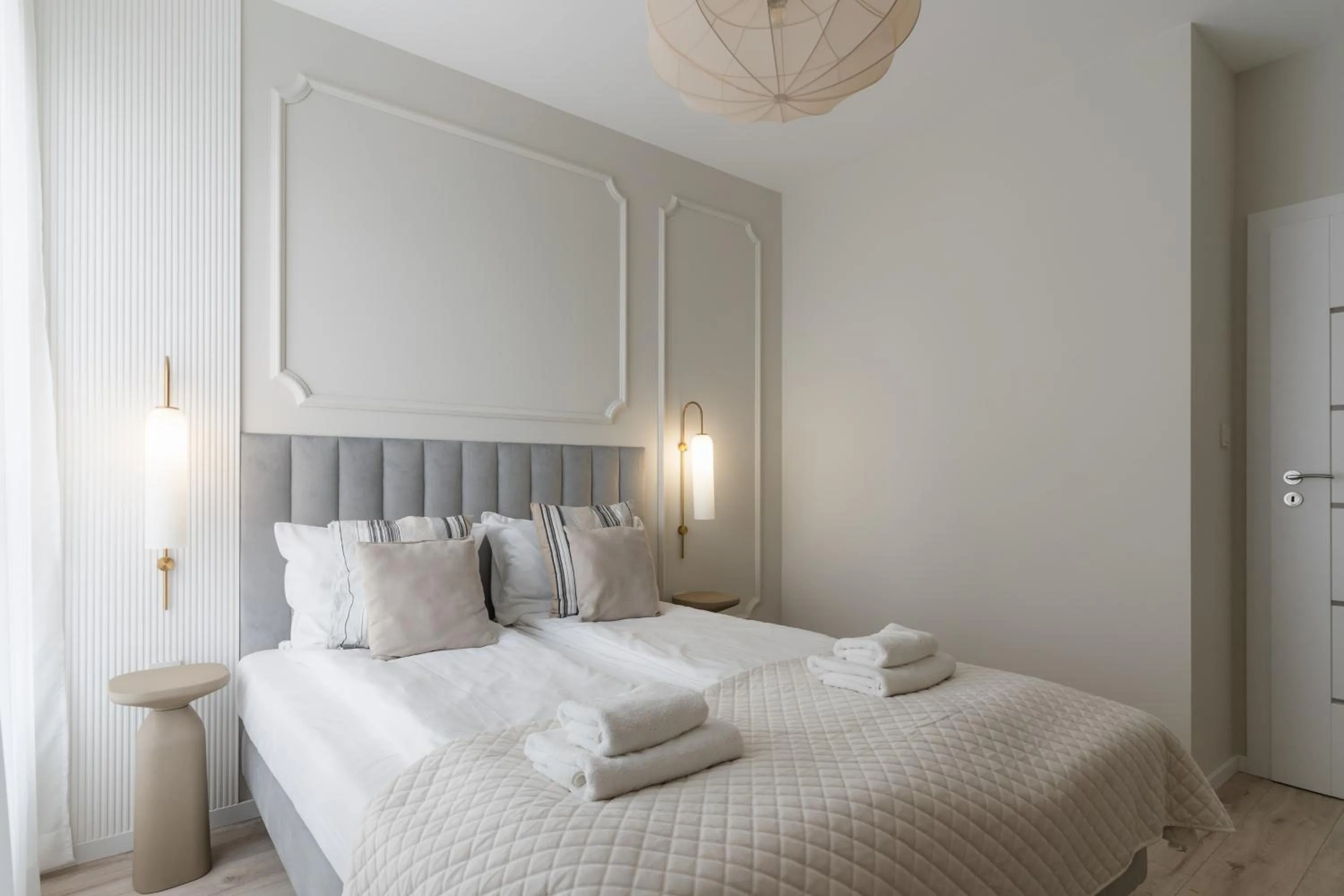 Bed in Symphony Modern Tower Apartamenty