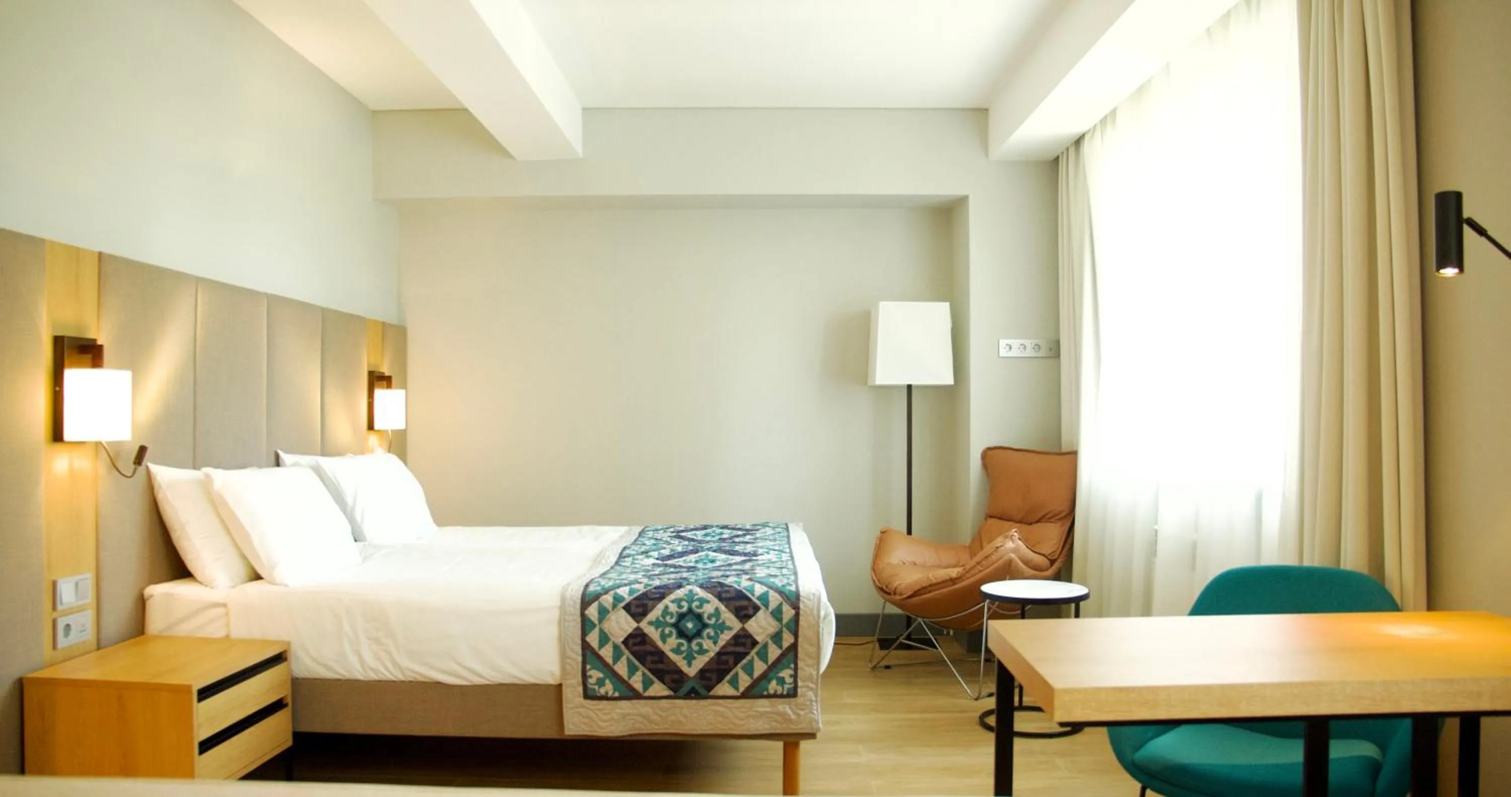 Bed in Sadu Hotel Almaty, a member of Radisson Individuals