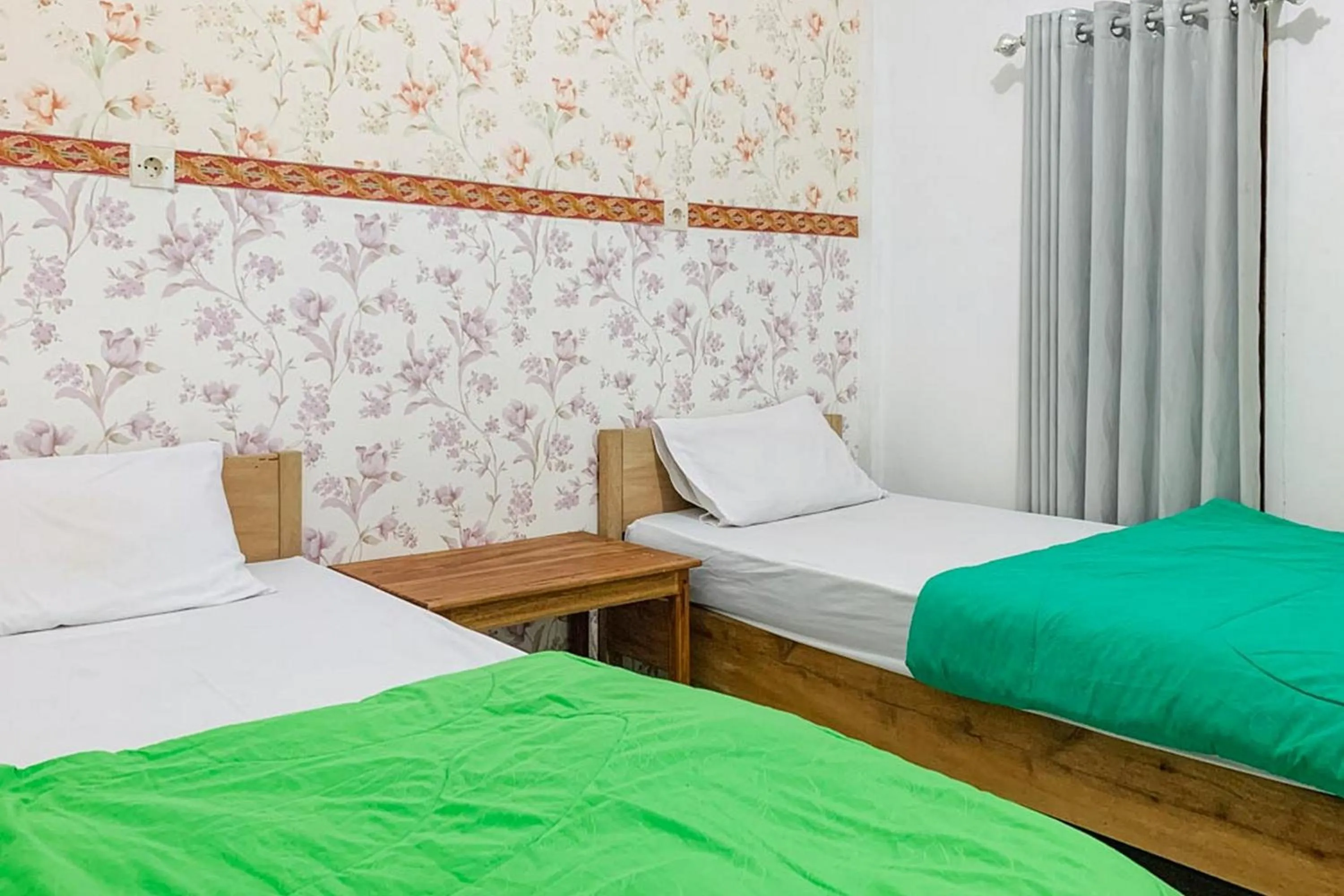 Bed in Lesehan Cahaya Tetebatu Inn Syariah at Desa Wisata