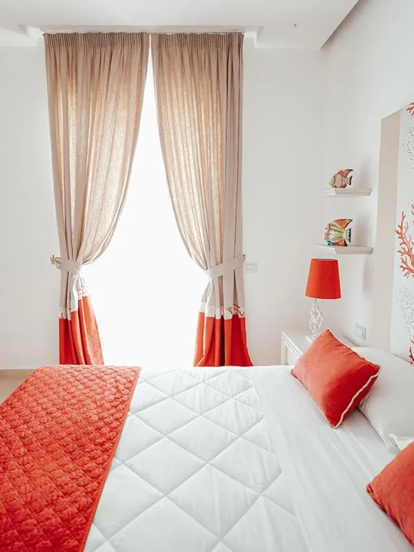 Bed in Hotel Corallo Sorrento
