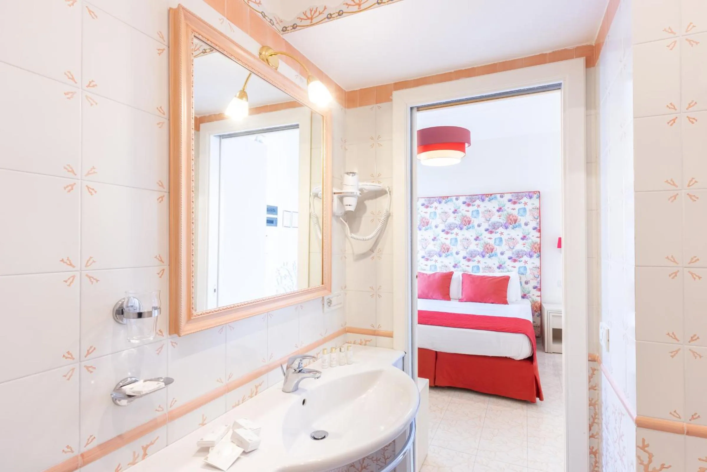 Bed in Hotel Corallo Sorrento