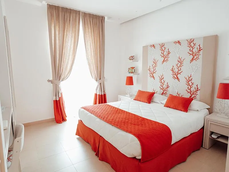 Bed in Hotel Corallo Sorrento
