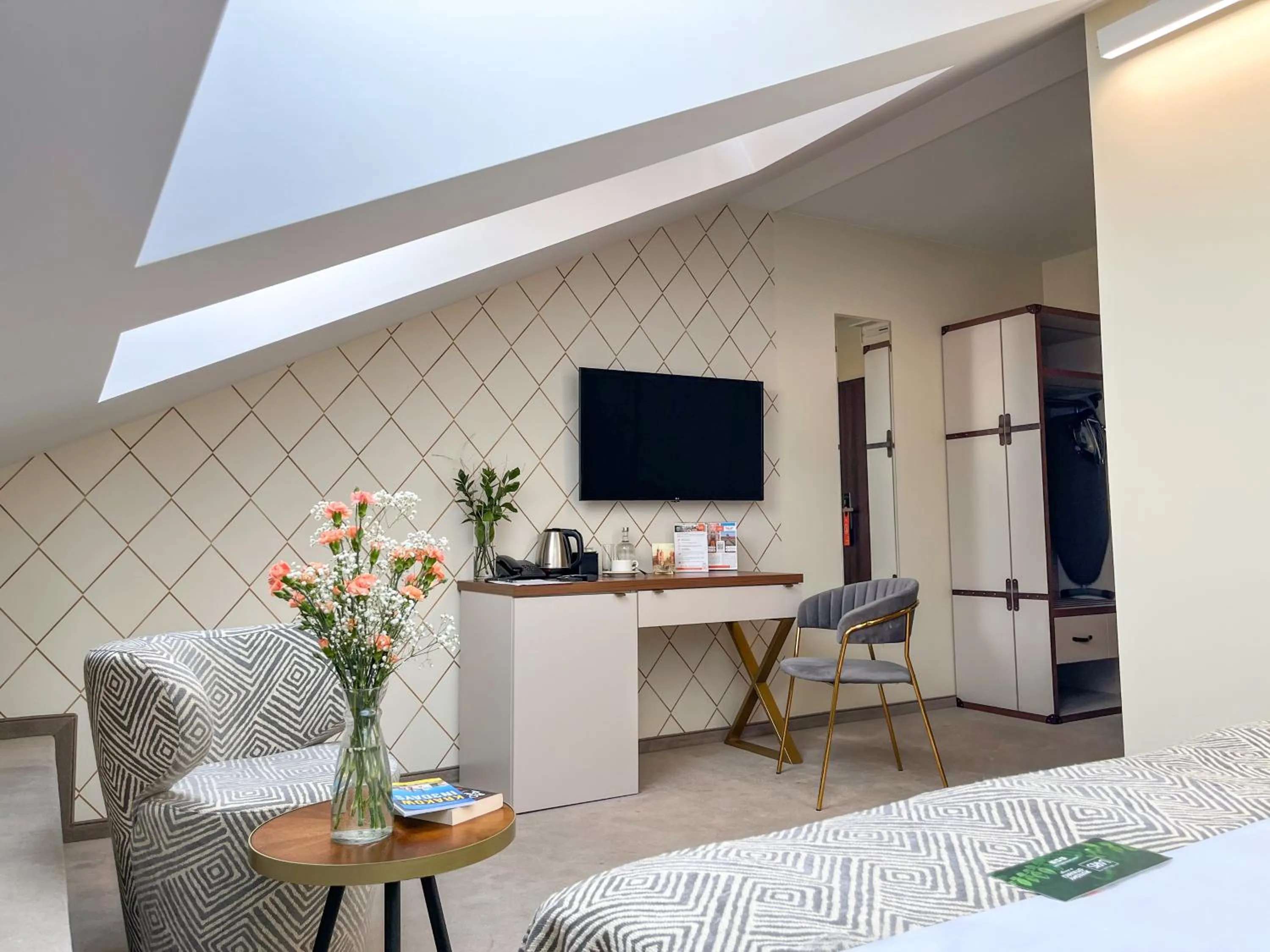 Seating area, Bed in Xerion Hotel