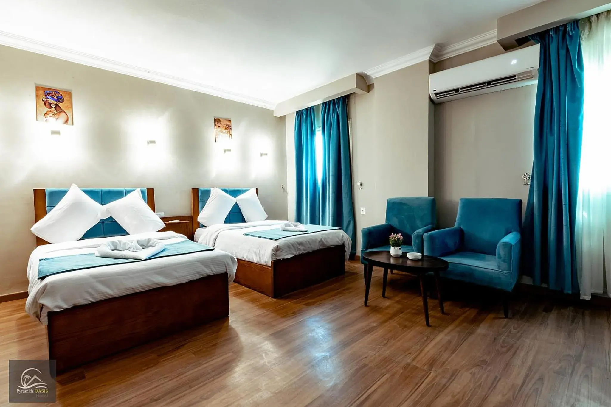 Deluxe Double Room with Two Double Beds in Pyramids Oasis Hotel Deluxe Double Room with Two Double Beds in Pyramids Oasis Hotel