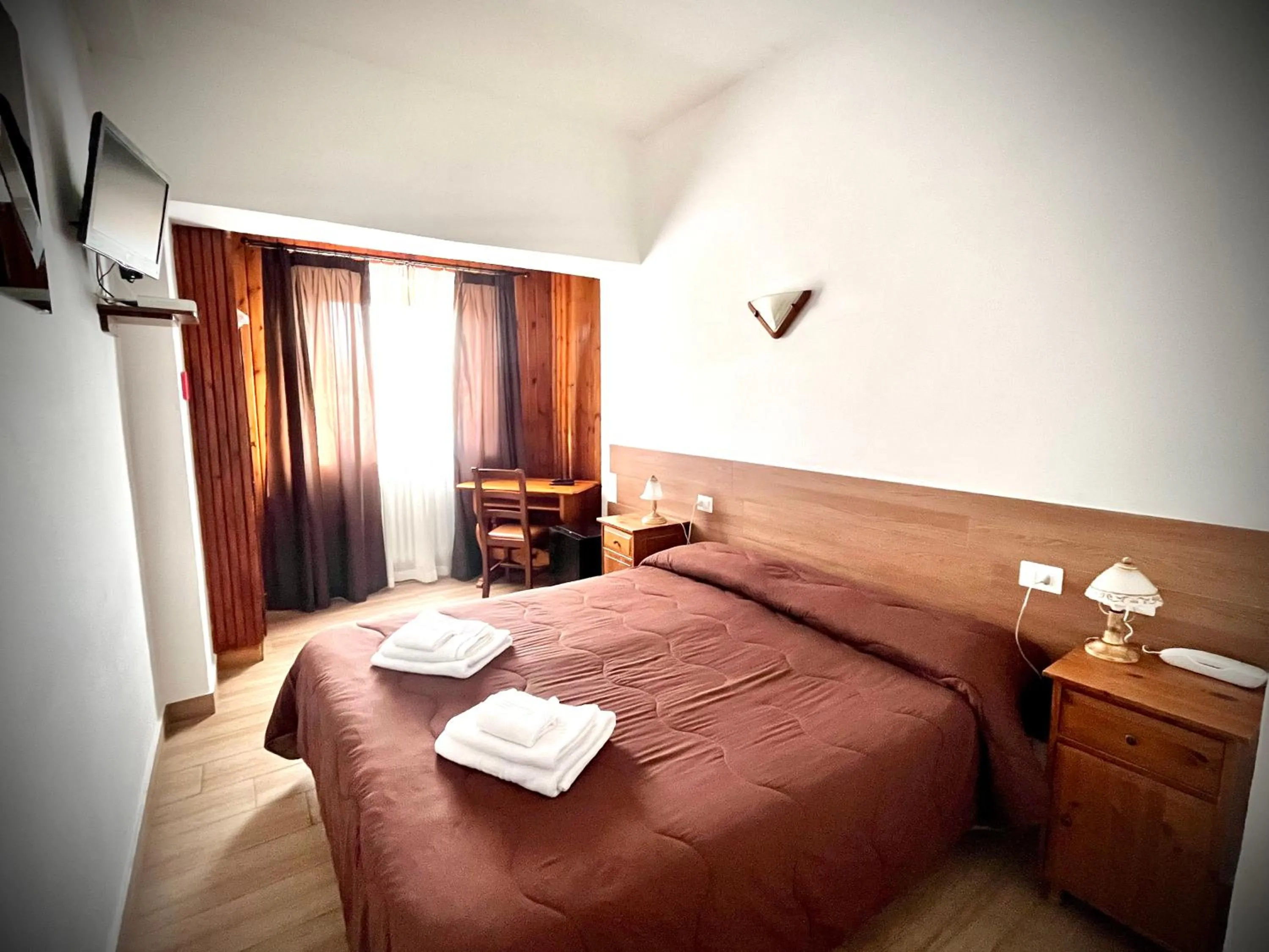 Bed in Hotel Pinguino