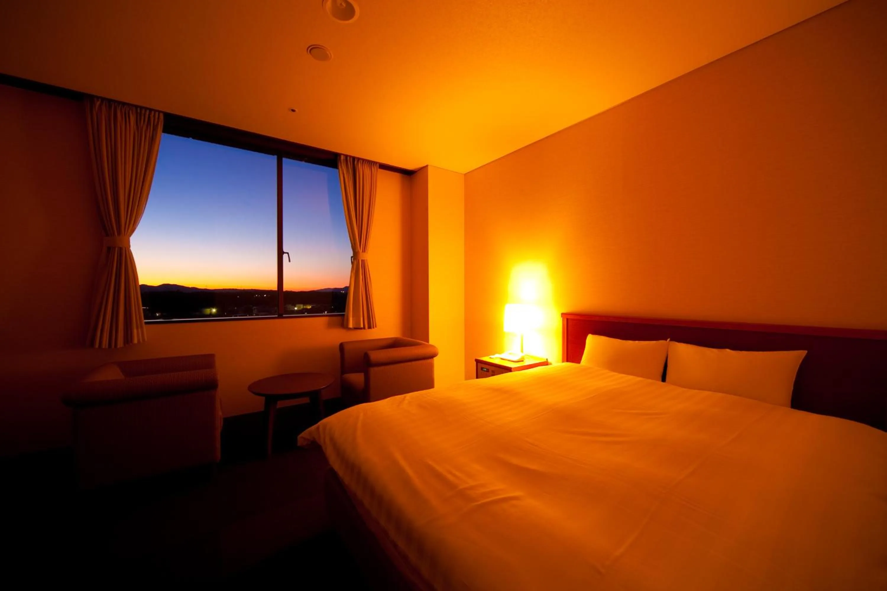 Bed in Kikunan Onsen Yubel Hotel