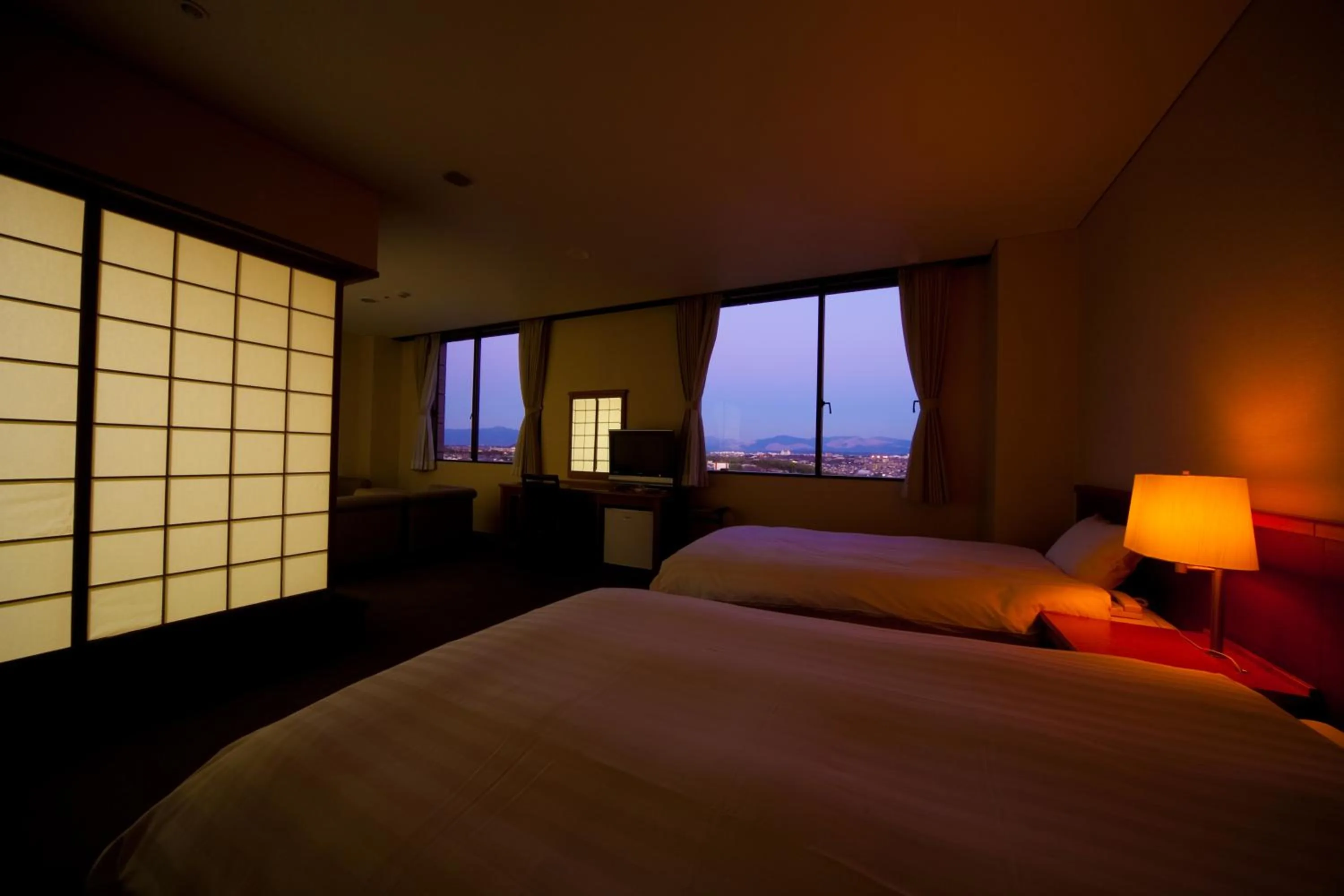 Bed in Kikunan Onsen Yubel Hotel