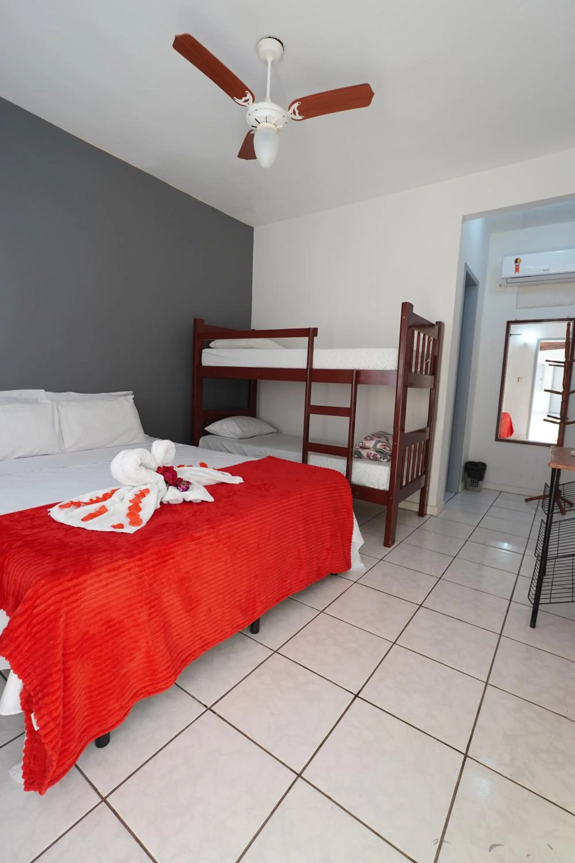 Bed in Pousada Frezza Mergulho