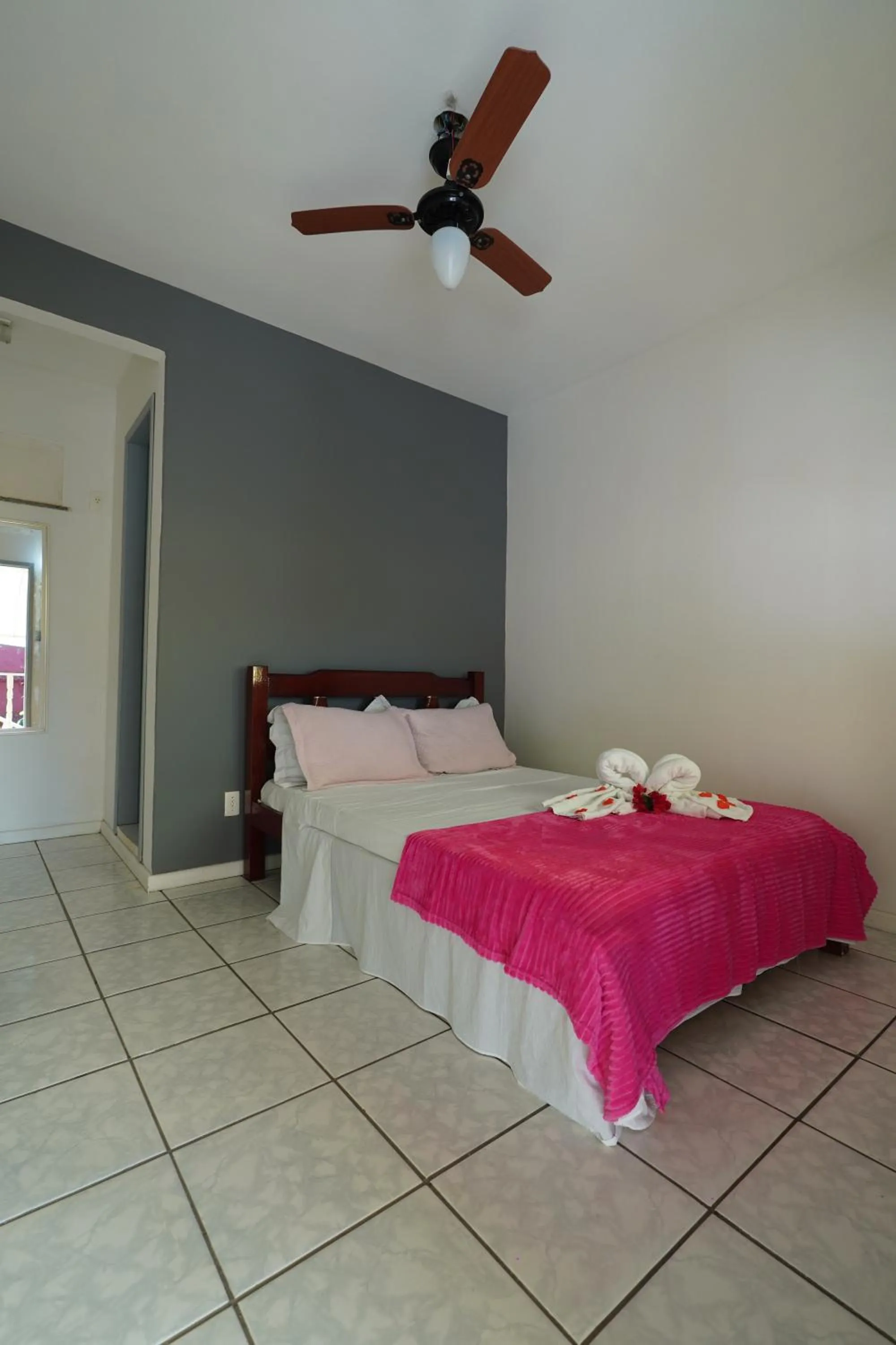 Bed in Pousada Frezza Mergulho