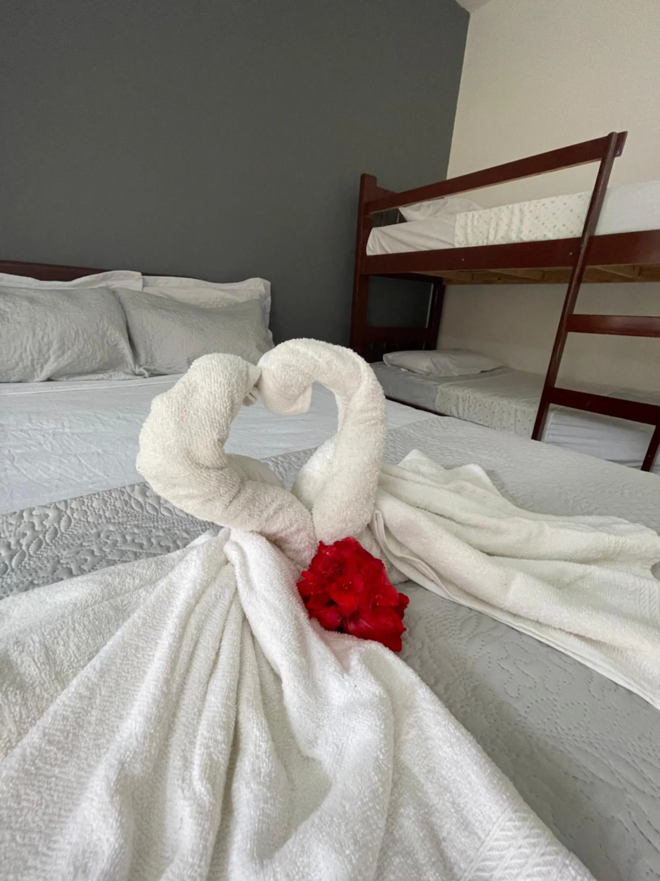 Bed in Pousada Frezza Mergulho