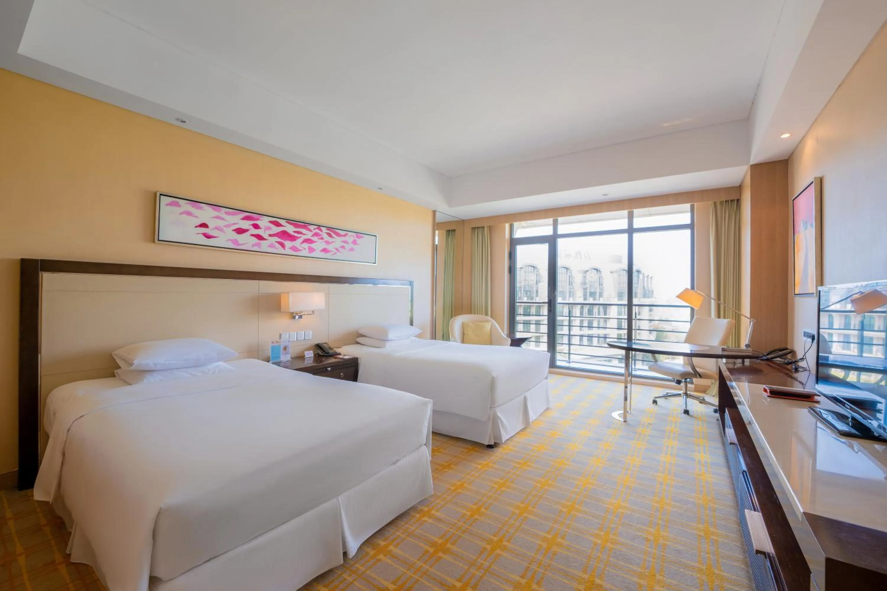 Bed in Sheraton Qinhuangdao Beidaihe Hotel