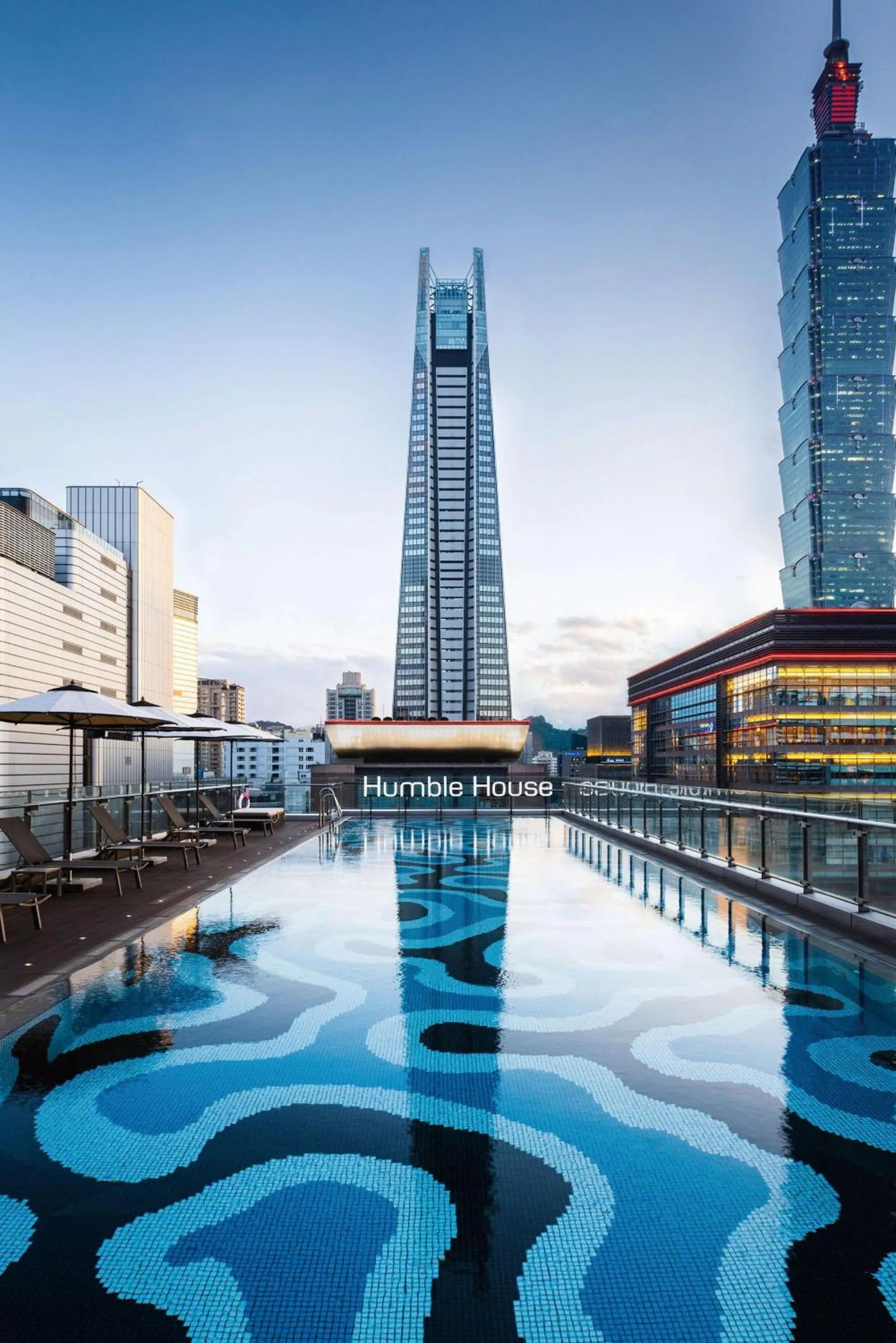 Pool view in Humble House Taipei, Curio Collection by Hilton