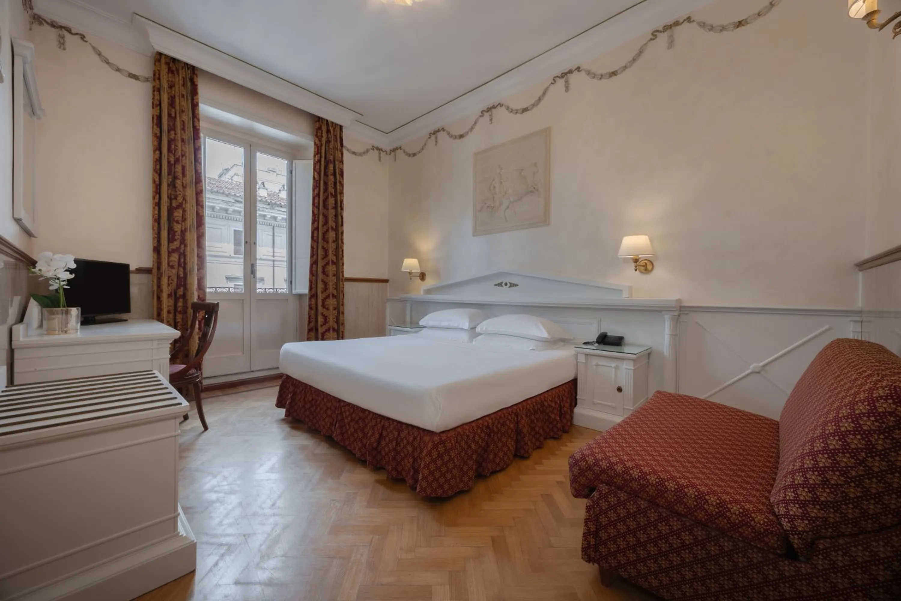 Bed in Hotel Palladium Palace