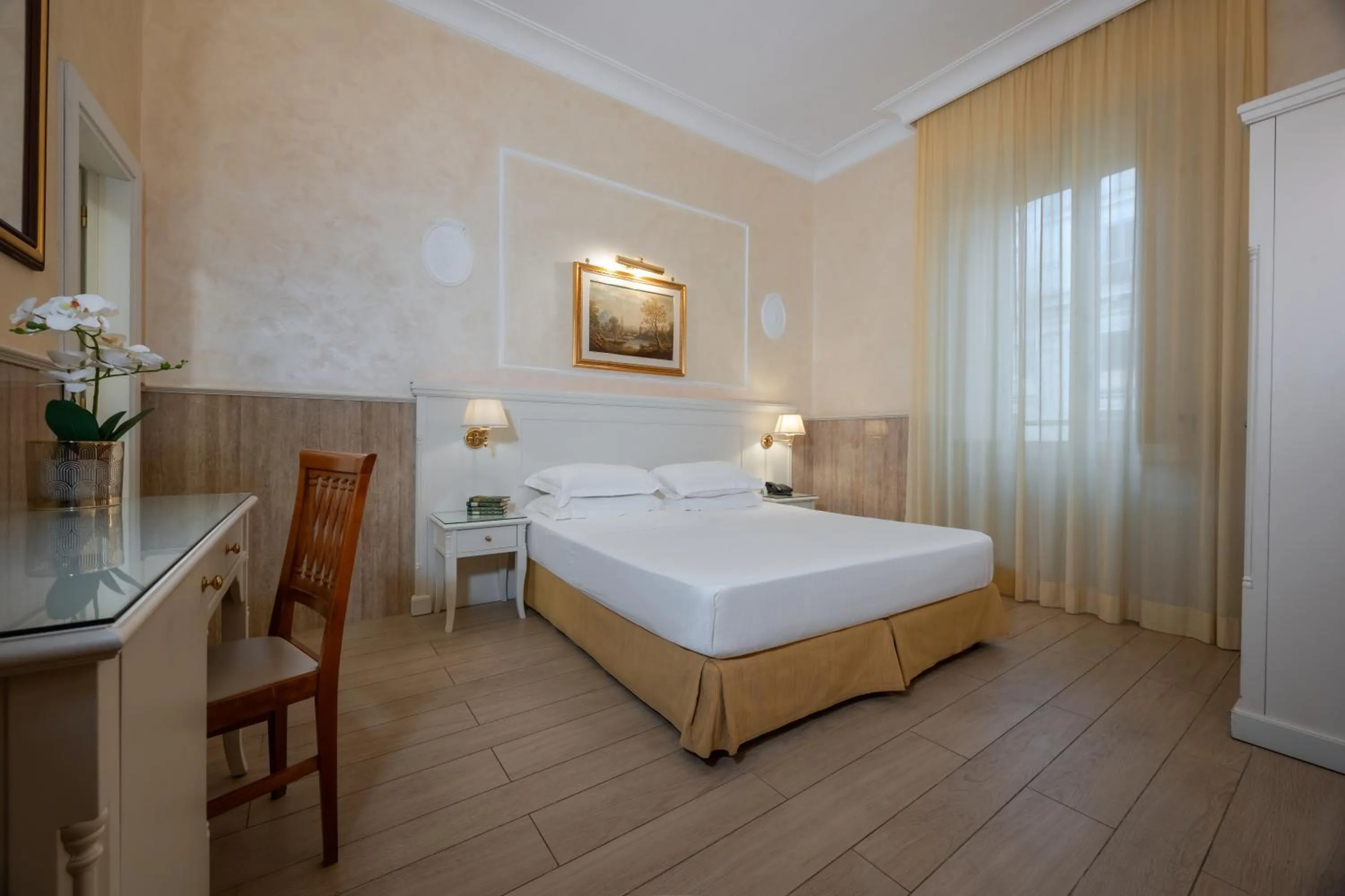 Bed in Hotel Palladium Palace