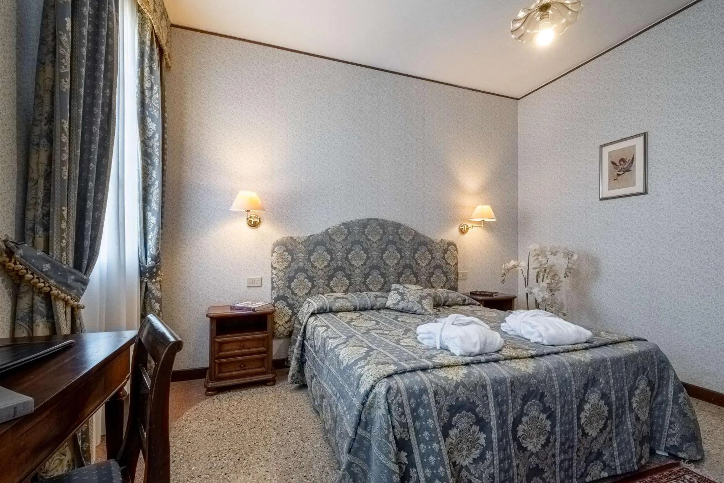 Bed in Hotel La Meridiana